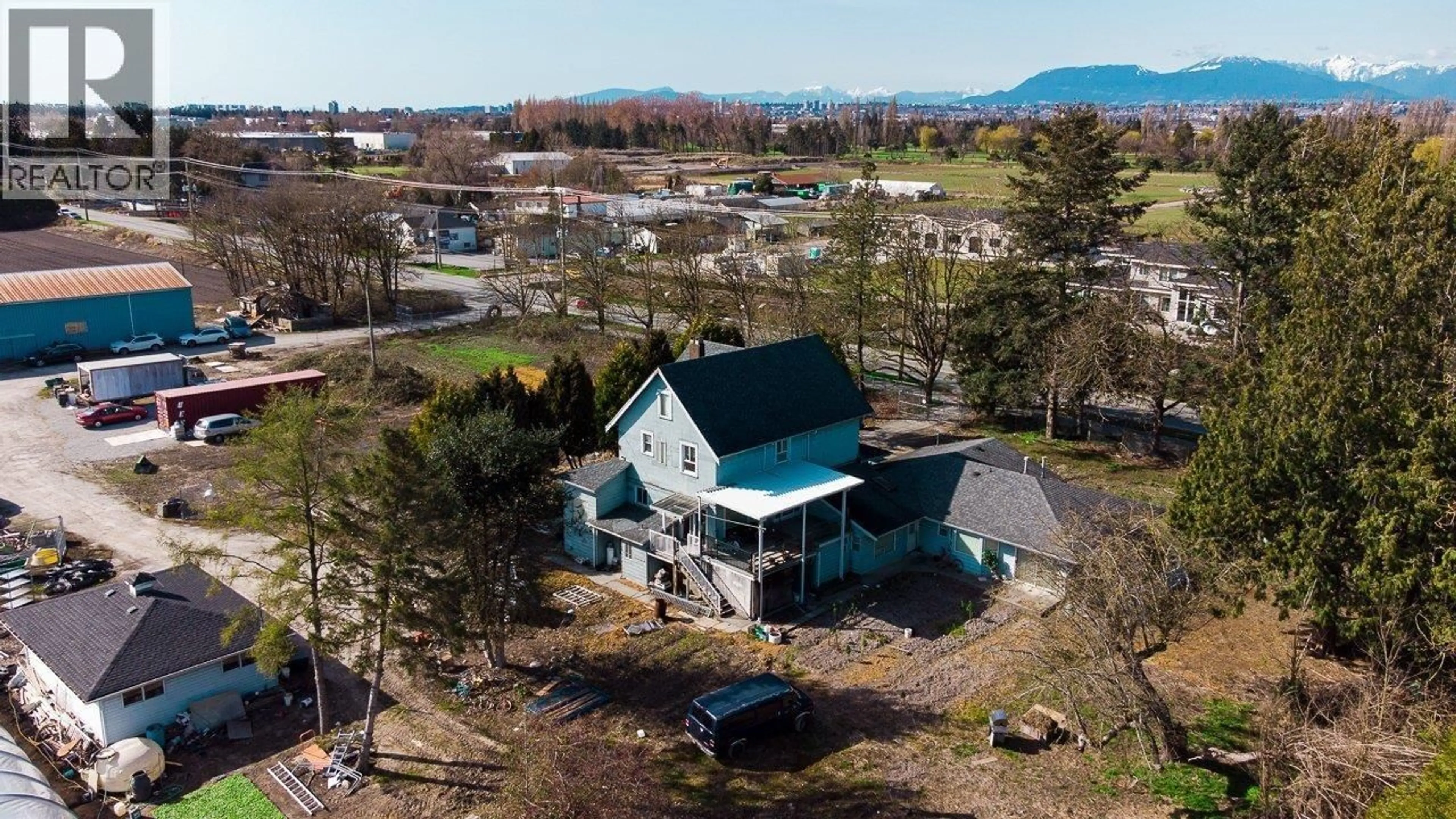A pic from outside/outdoor area/front of a property/back of a property/a pic from drone, mountain view for 14780 WESTMINSTER HIGHWAY, Richmond British Columbia V6V1A5