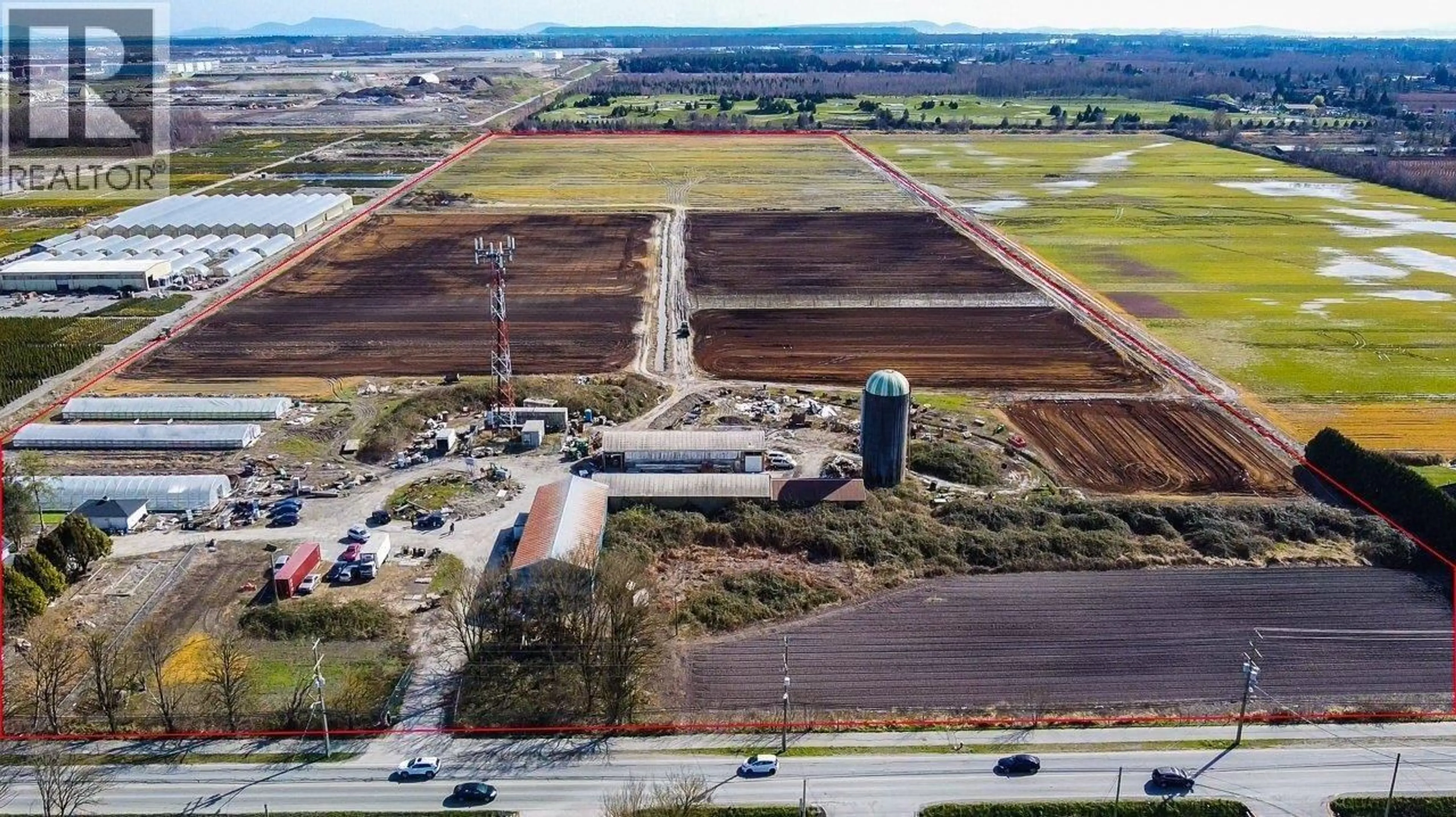 A pic from outside/outdoor area/front of a property/back of a property/a pic from drone, building for 14780 WESTMINSTER HIGHWAY, Richmond British Columbia V6V1A5