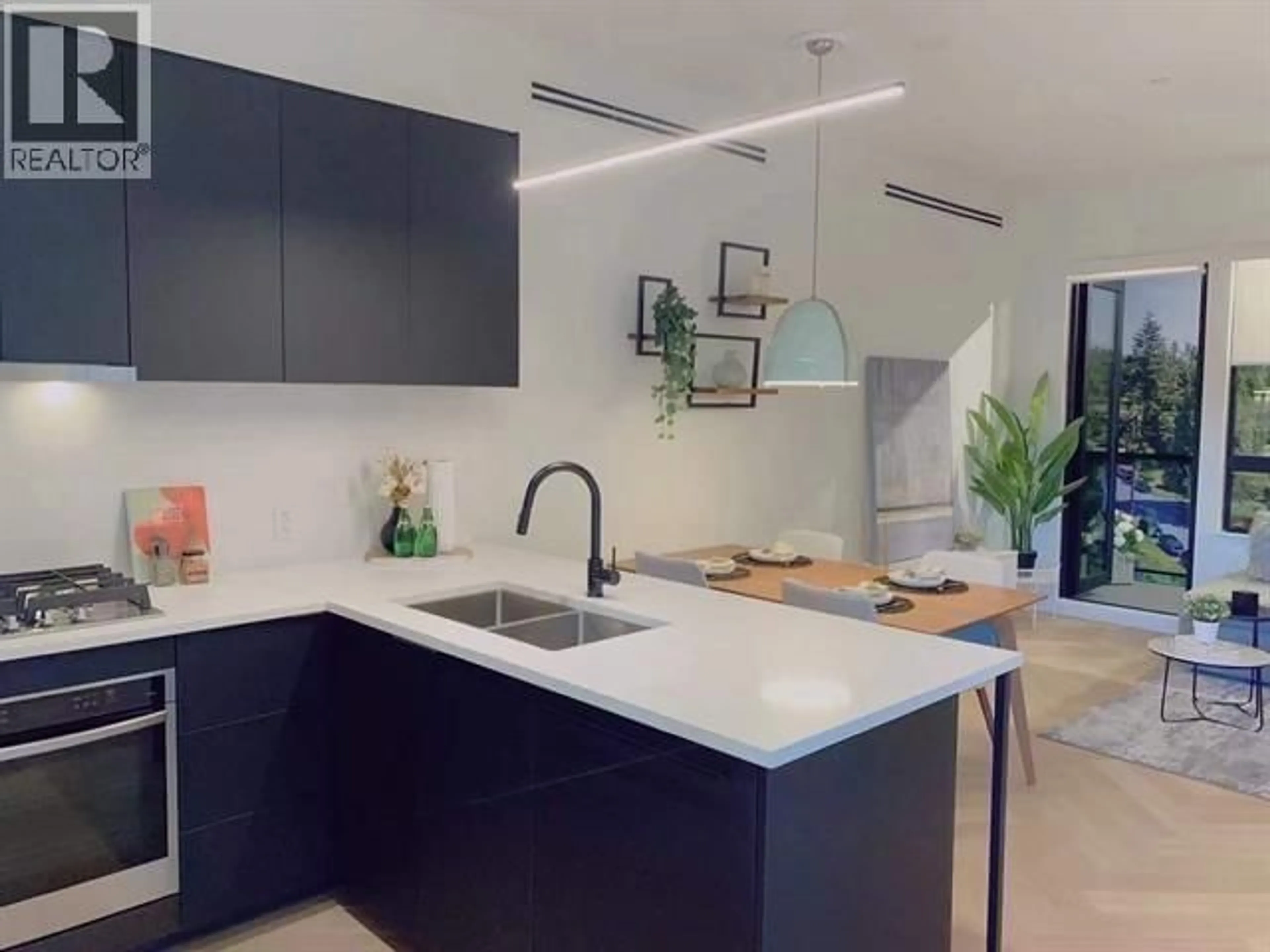 Open concept kitchen, ceramic/tile floor for 704 - 599 DANSEY AVENUE, Coquitlam British Columbia V3K3E9