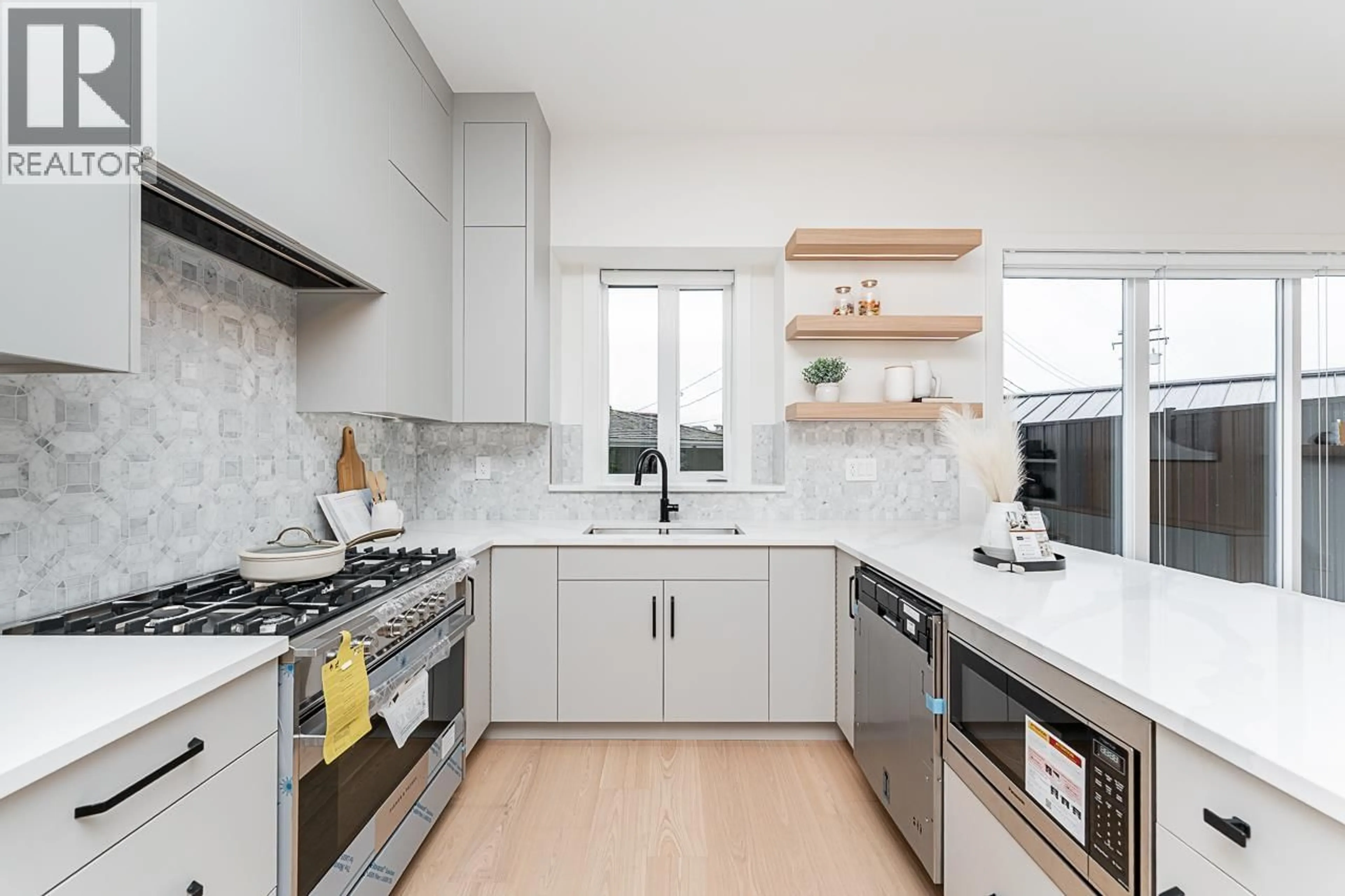 Contemporary kitchen, ceramic/tile floor for 2 - 2837 OLIVER CRESCENT, Vancouver British Columbia V6L1T1