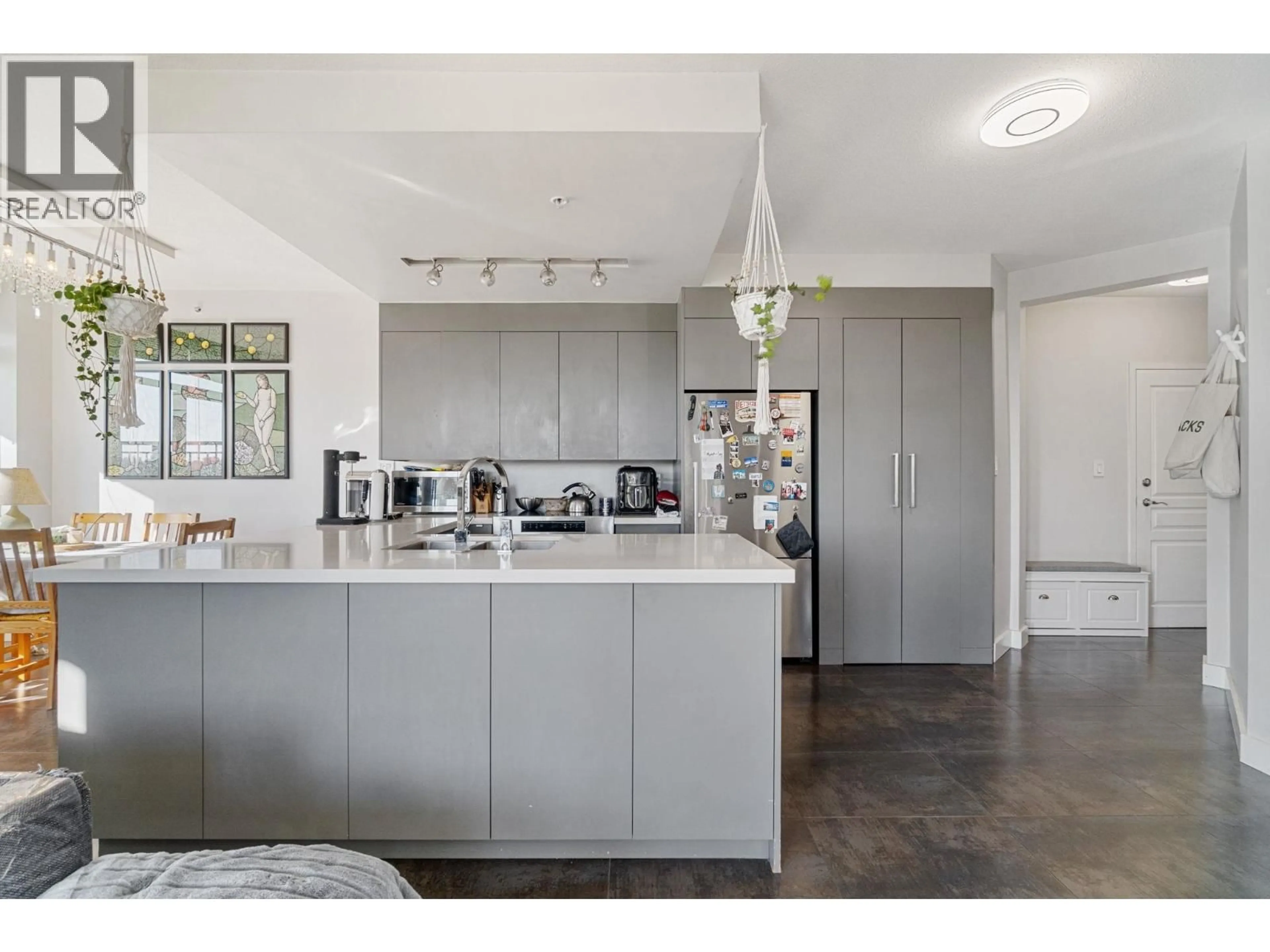 Open concept kitchen, unknown for 654 - 1483 KING EDWARD AVENUE, Vancouver British Columbia V5N5Z3