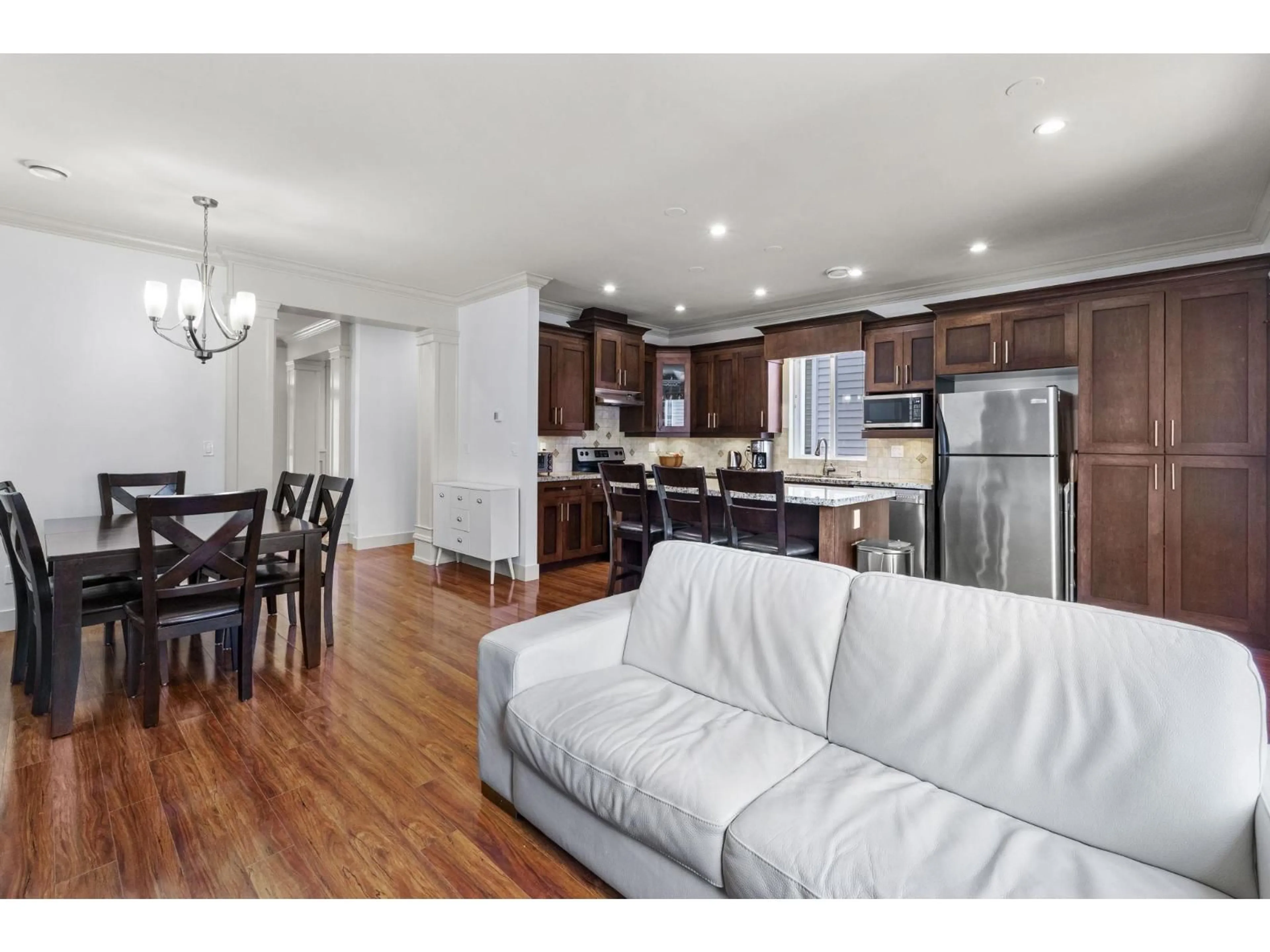 Open concept kitchen, wood/laminate floor for 6746 191A STREET, Surrey British Columbia V4N6A5