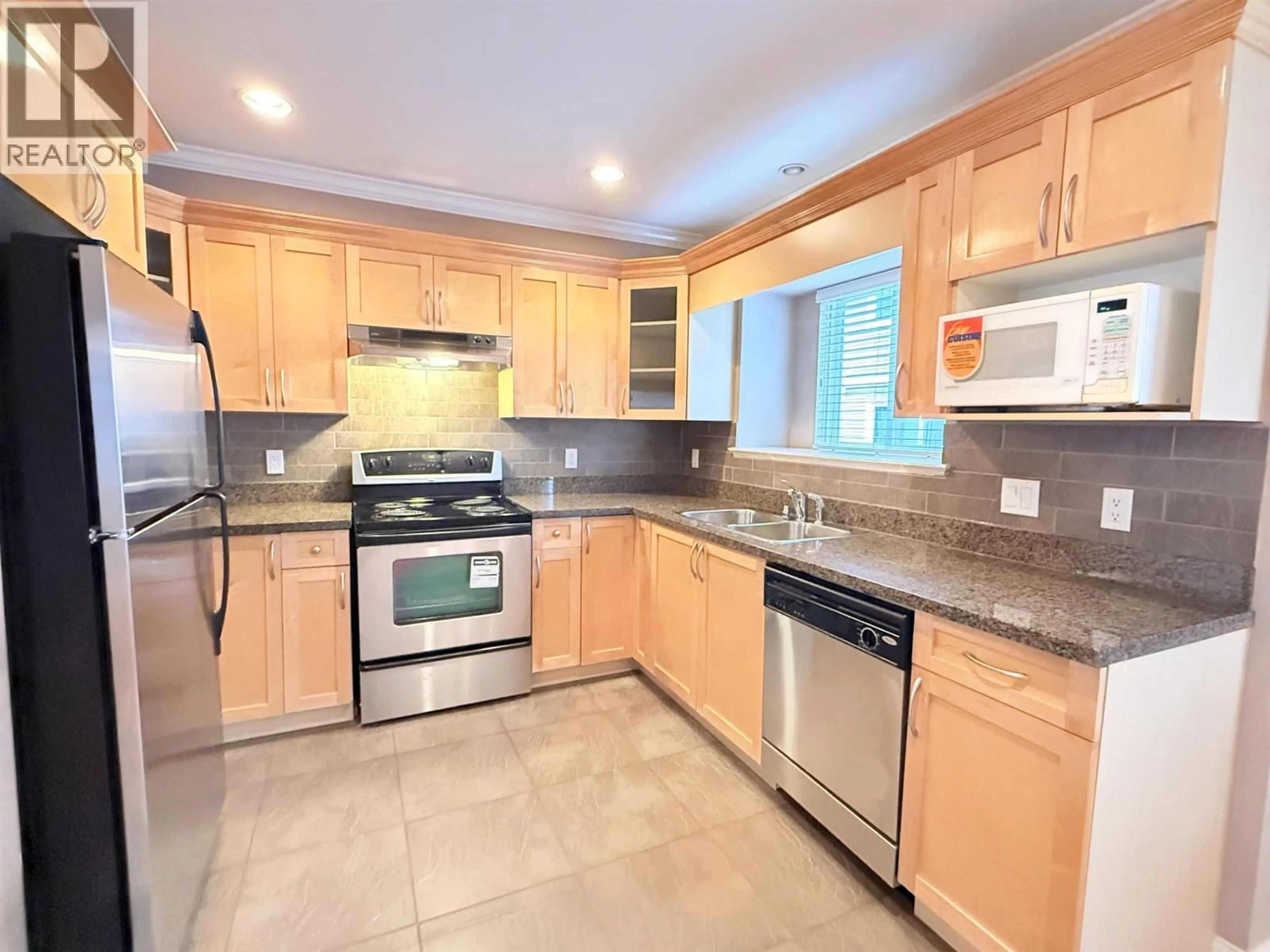 Standard kitchen, ceramic/tile floor for 102 - 3760 DOMINION STREET, Burnaby British Columbia V5G1B9