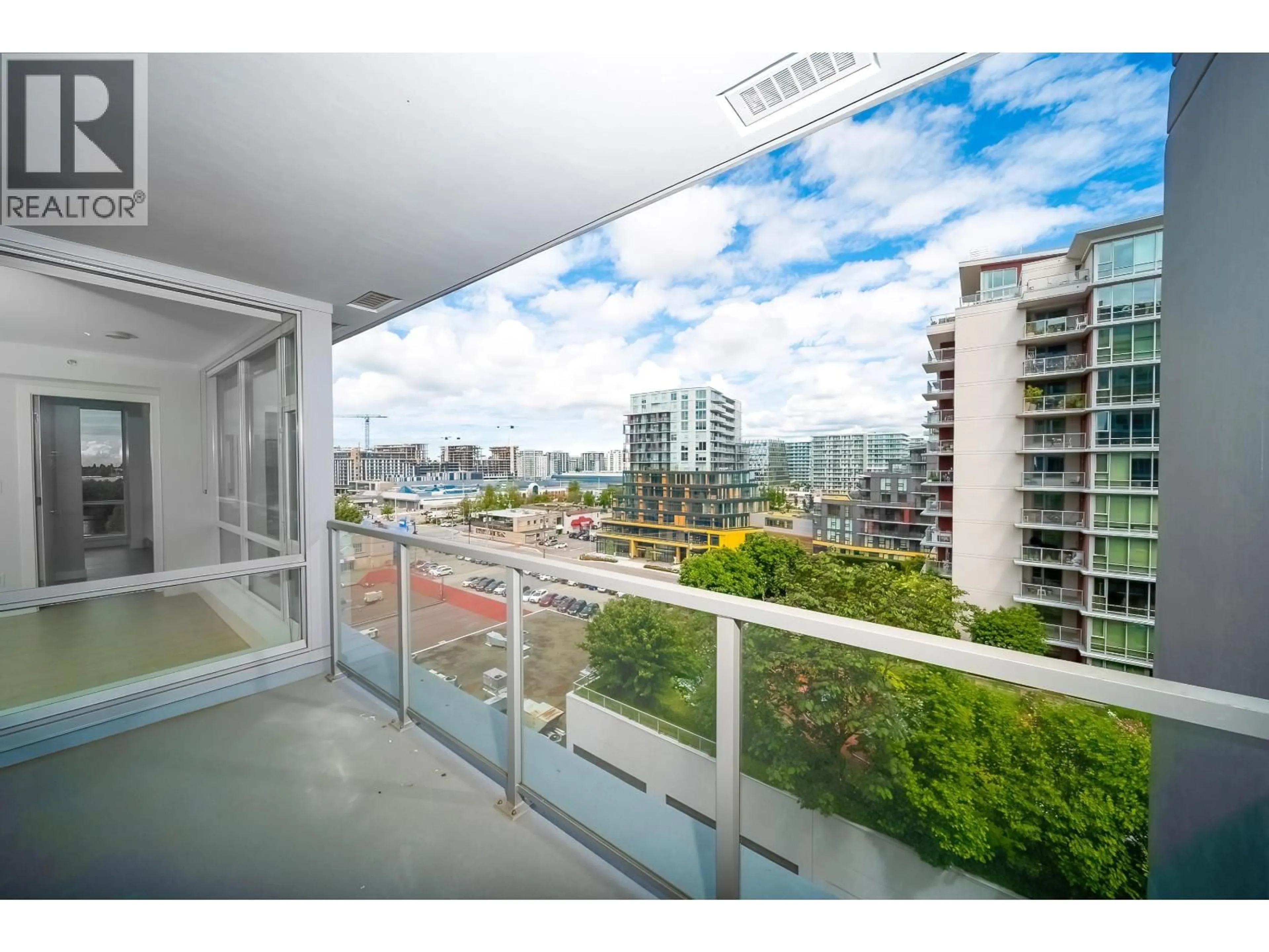 Balcony in the apartment, city buildings view from balcony for 1005 - 6833 BUSWELL STREET, Richmond British Columbia V6Y0L3