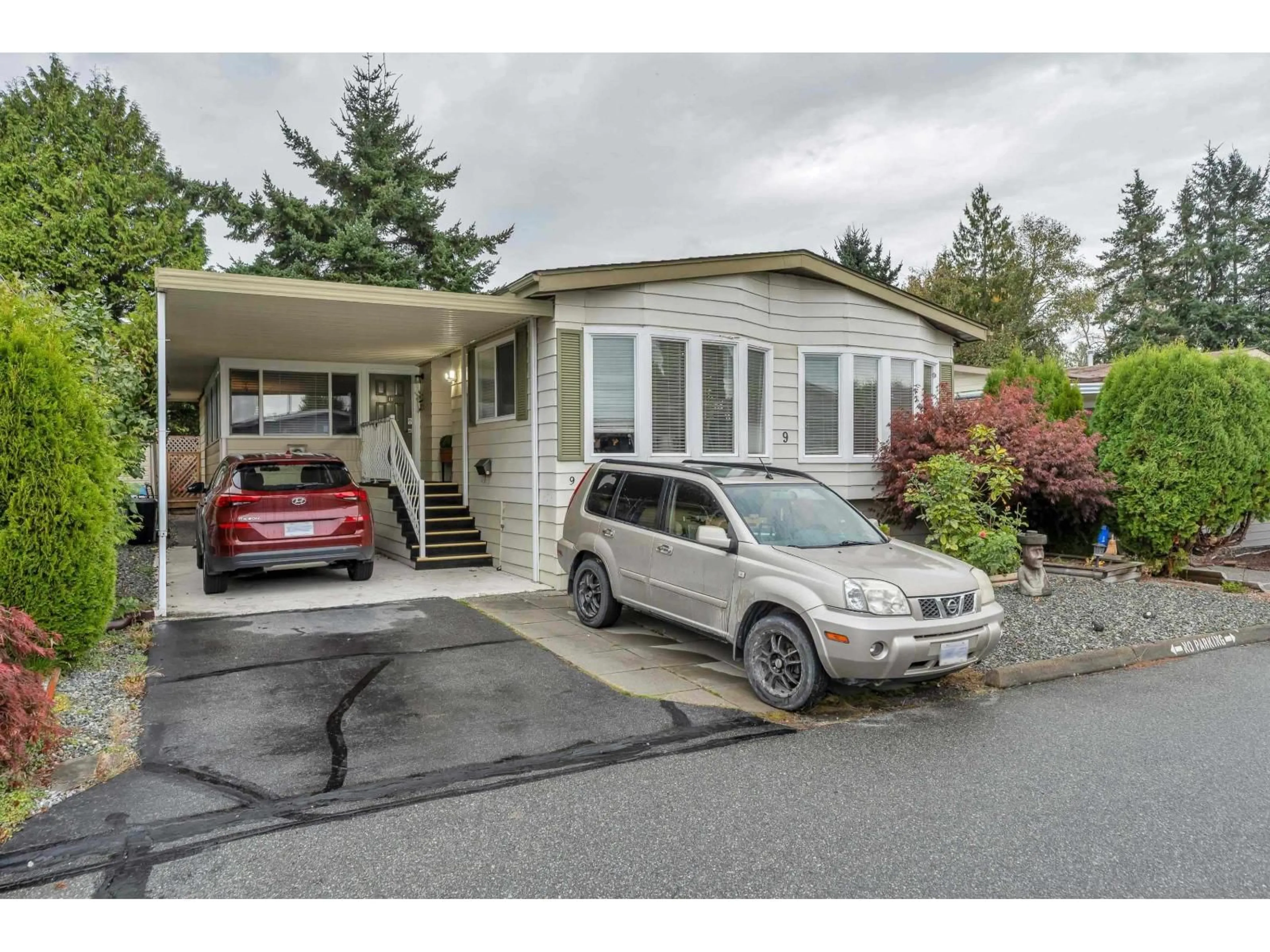 Home with vinyl exterior material, street for 9 - 1640 162 STREET, Surrey British Columbia V4A6Y9