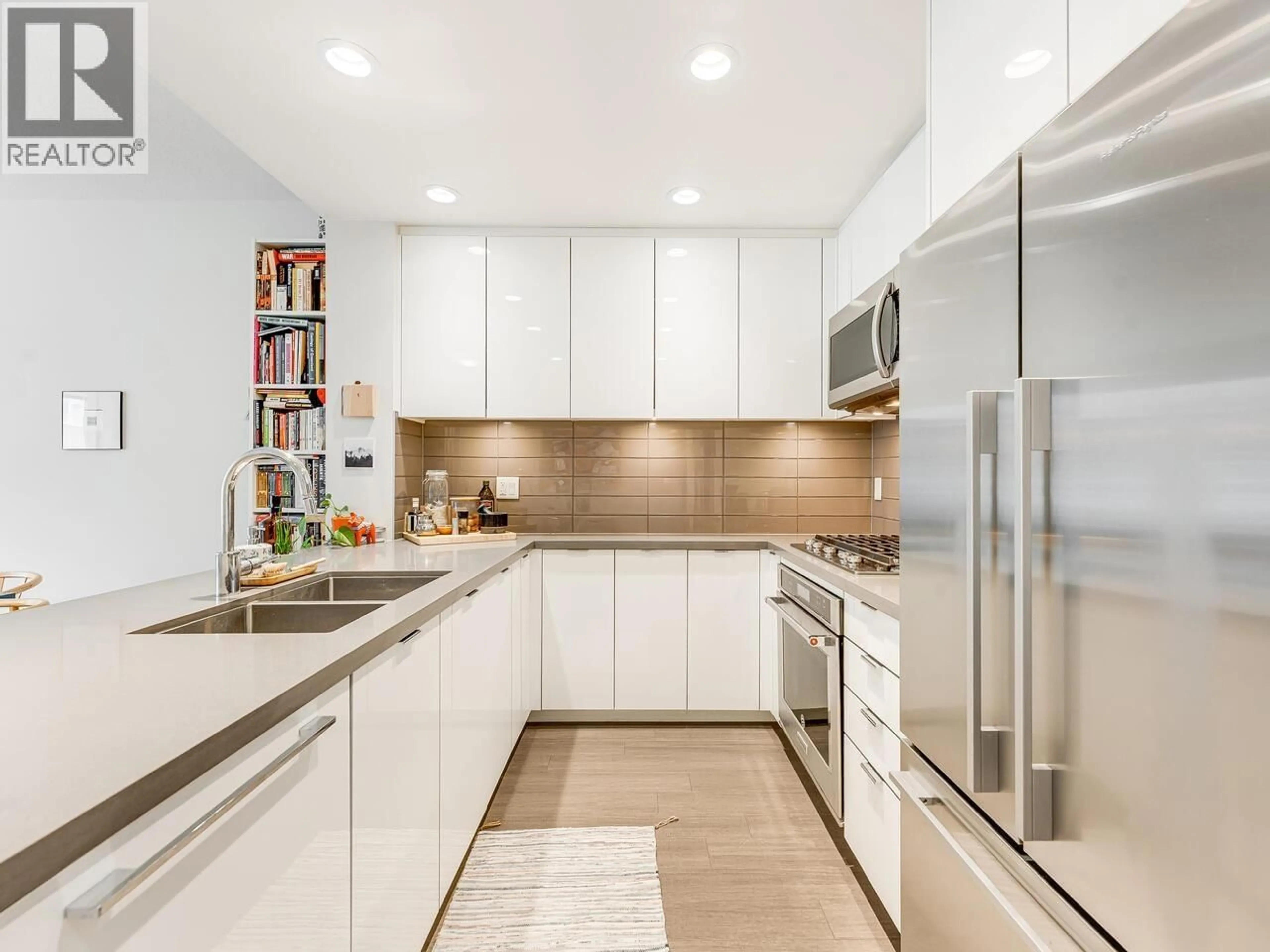 Contemporary kitchen, ceramic/tile floor for 412 - 255 1ST STREET, North Vancouver British Columbia V7M3G8