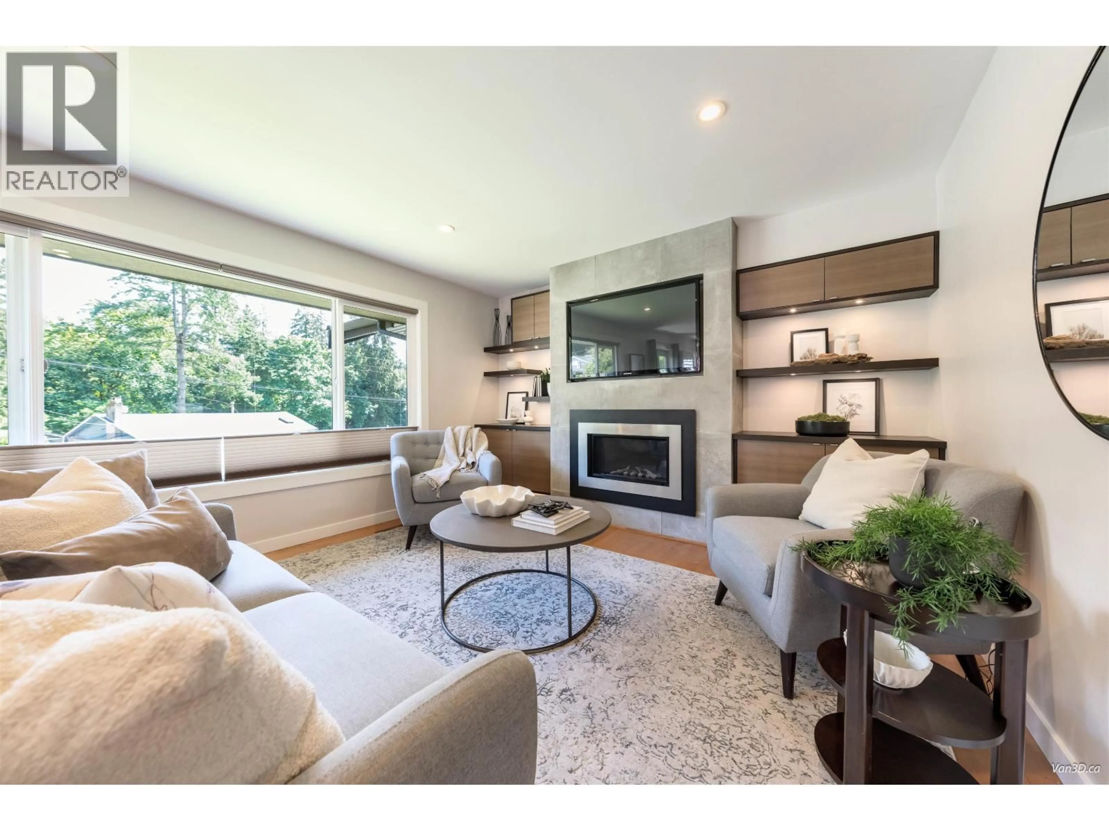 Living room with furniture, wood/laminate floor for 949 HARTFORD PLACE, North Vancouver British Columbia V7H2J8