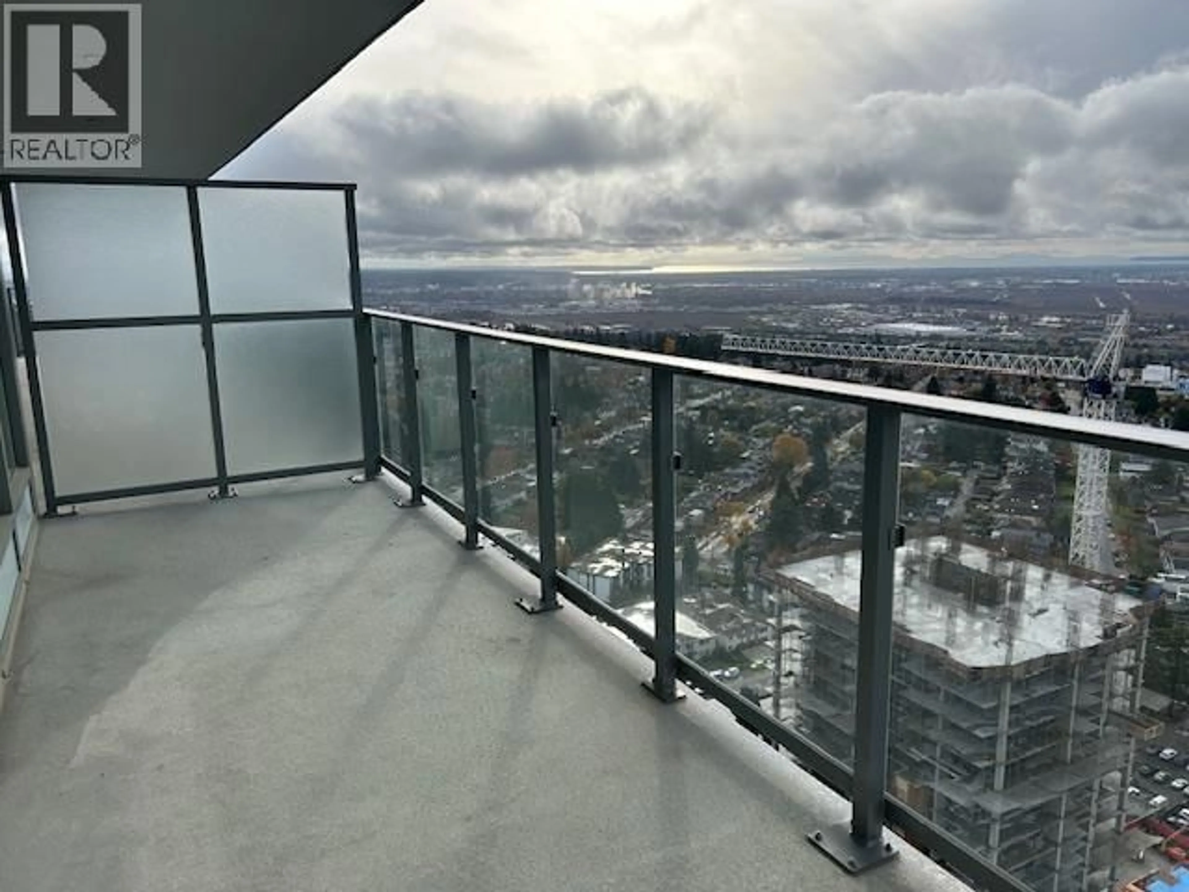 Balcony in the apartment, city buildings view from balcony for 3205 - 6511 SUSSEX AVENUE, Burnaby British Columbia V5H0K5