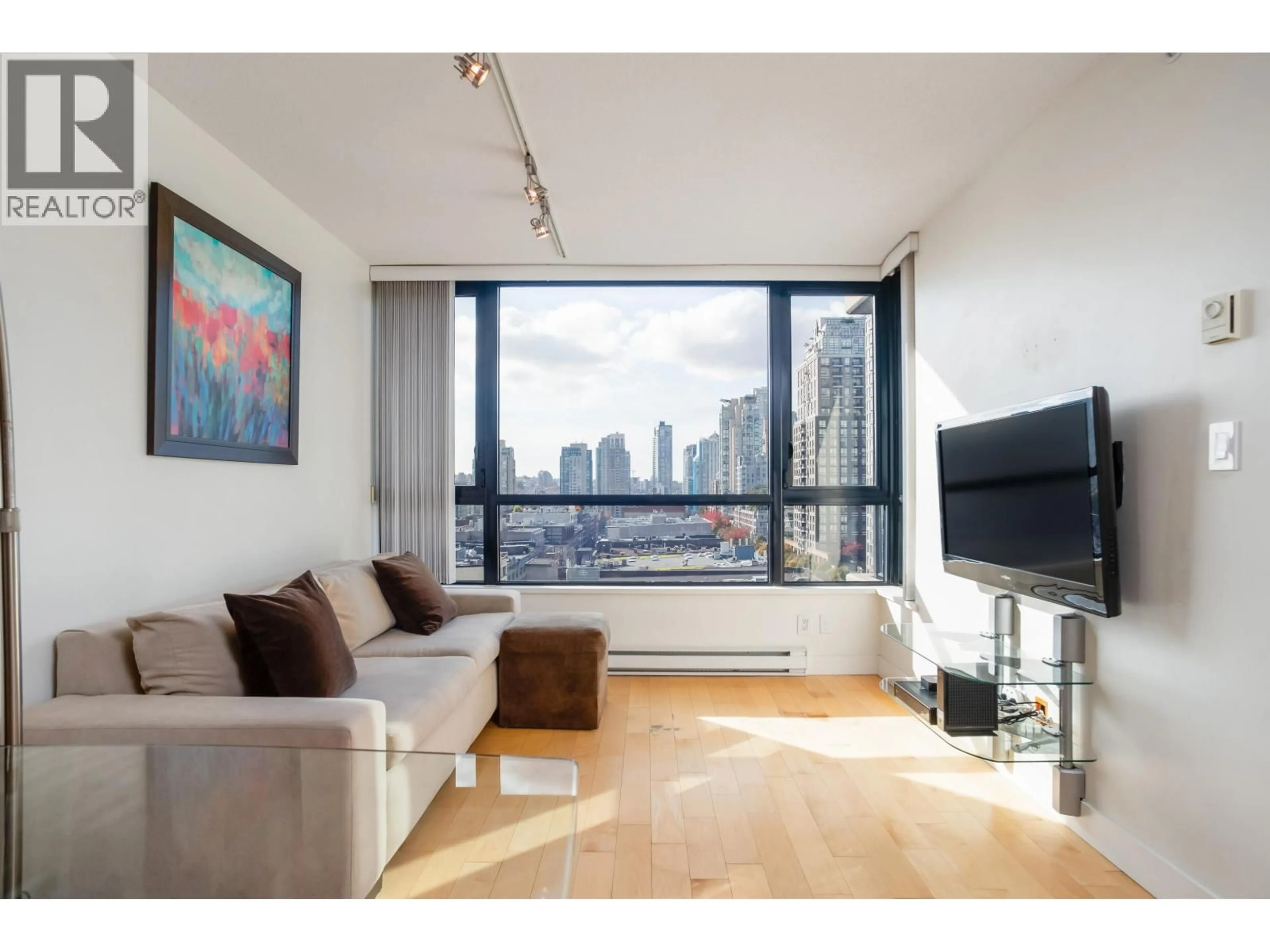 Living room with furniture, wood/laminate floor for 1110 - 928 HOMER STREET, Vancouver British Columbia V6B1T7
