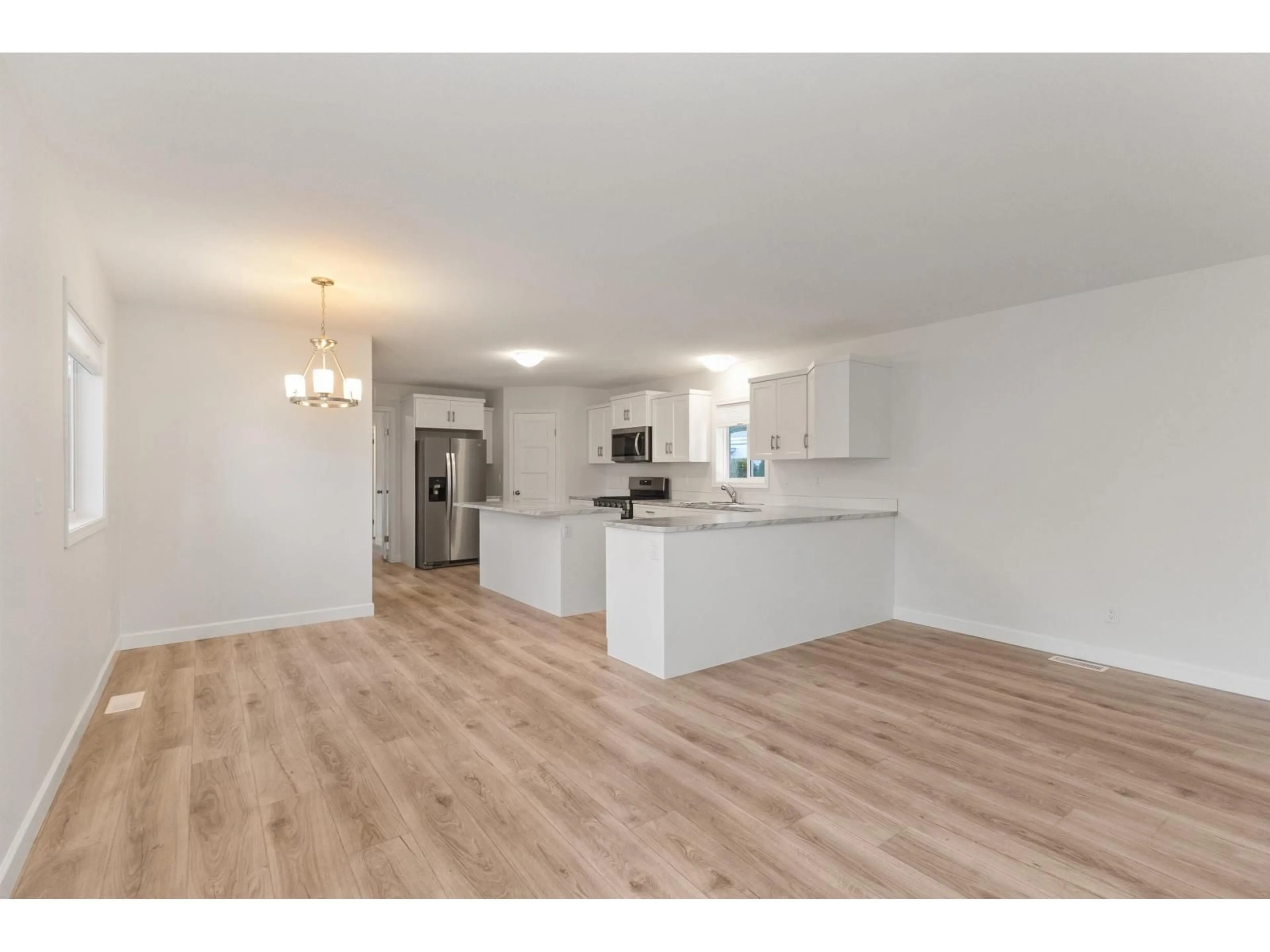 Open concept kitchen, wood/laminate floor for 19 - 24330 FRASER HIGHWAY, Langley British Columbia V2Z1N2