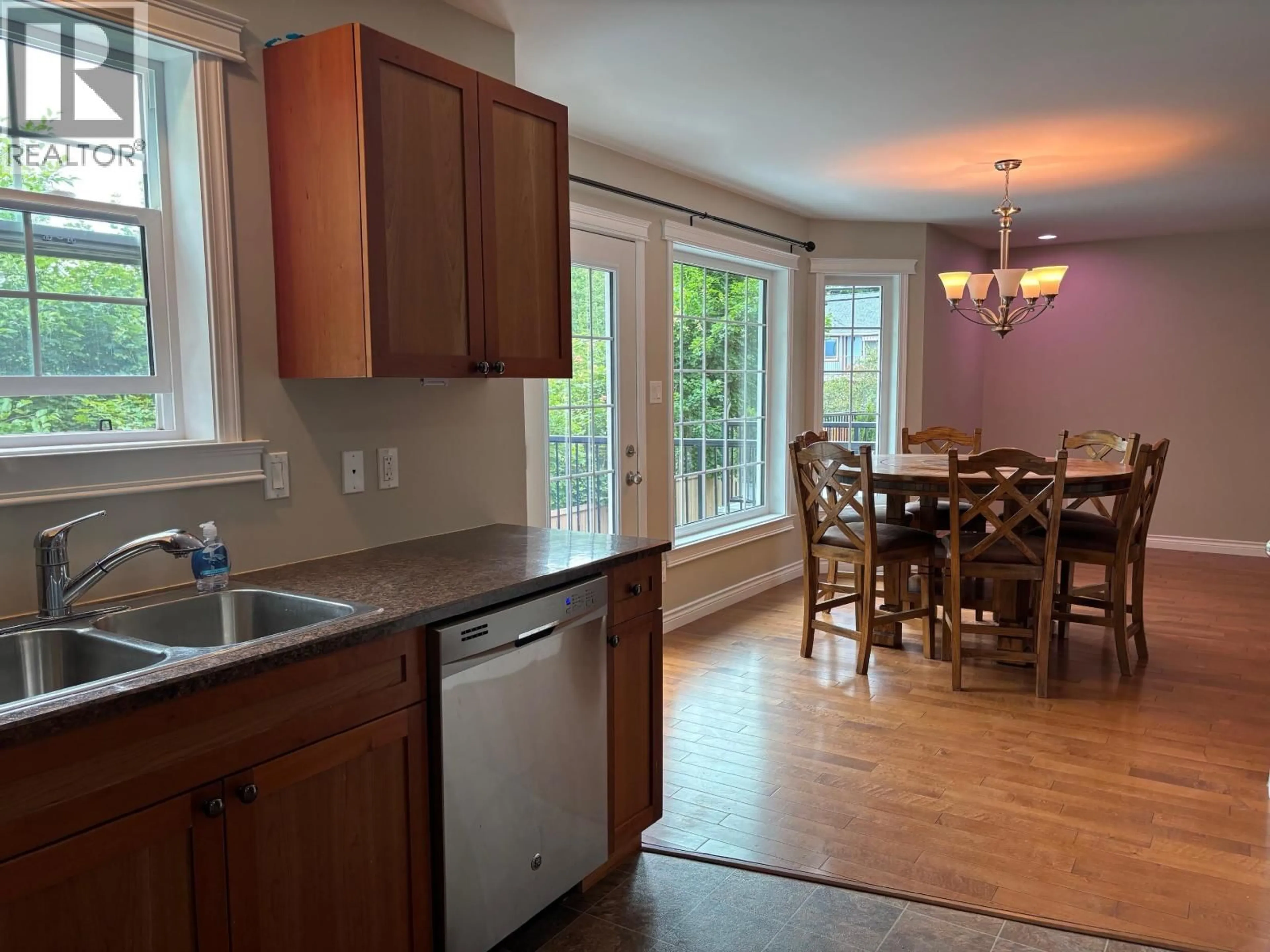 Open concept kitchen, wood/laminate floor for 1 - 3239 APSLEY STREET, Terrace British Columbia V8G0J5