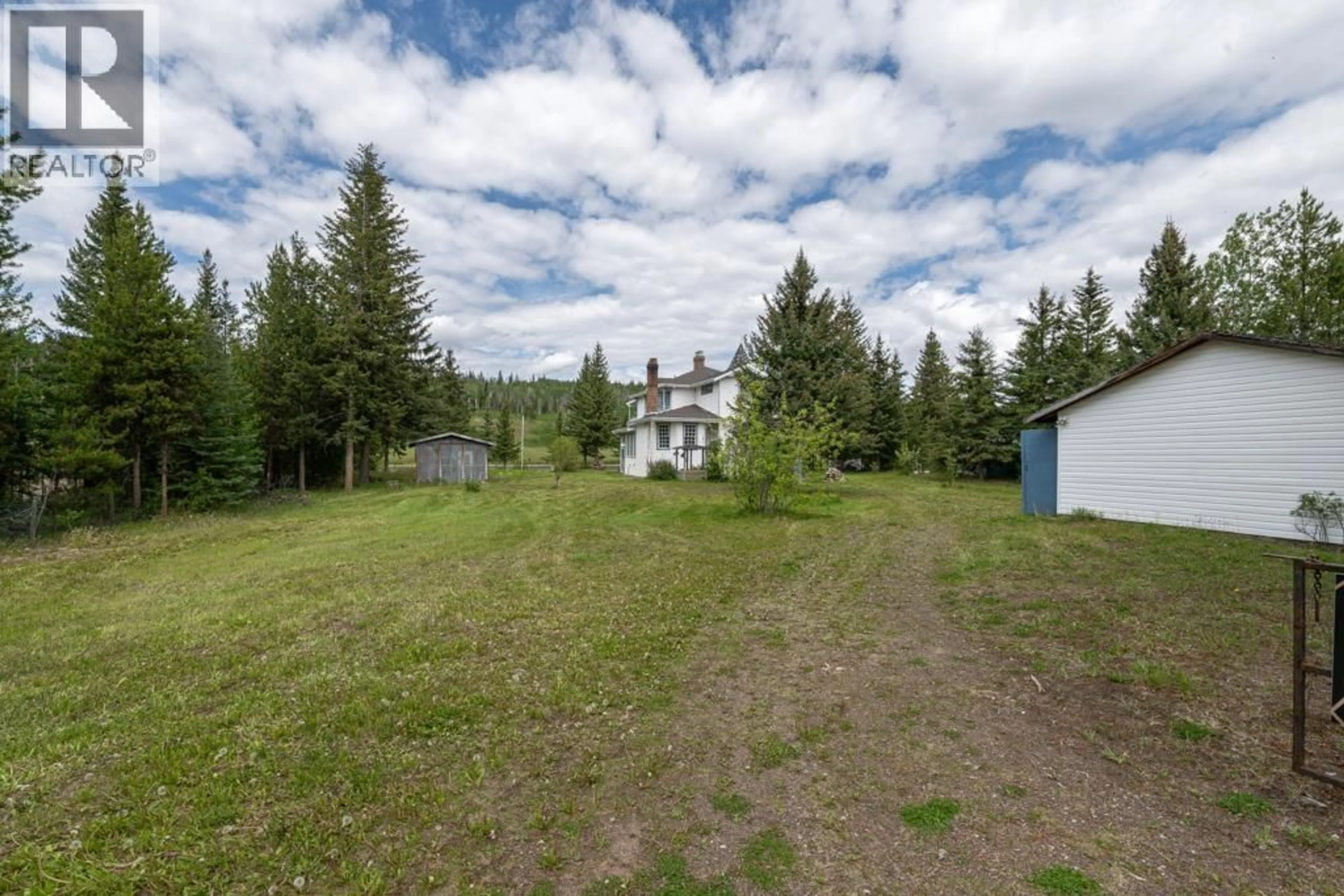 A pic from outside/outdoor area/front of a property/back of a property/a pic from drone, unknown for 6649 RAYFIELD ROAD, 70 Mile House British Columbia V0K2K0