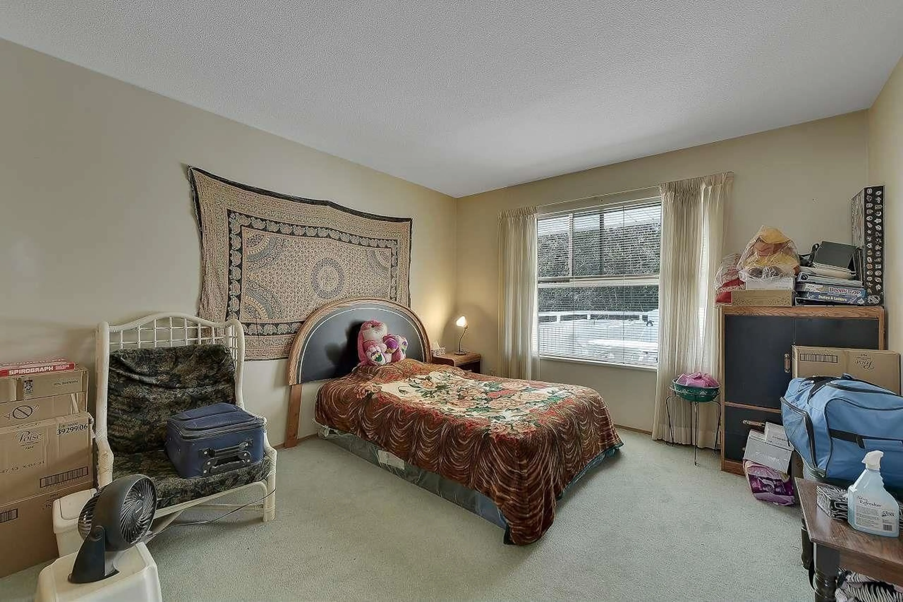 Bedroom with bed, carpet floor for 204 - 7156 121 STREET, Surrey British Columbia V3W0J6