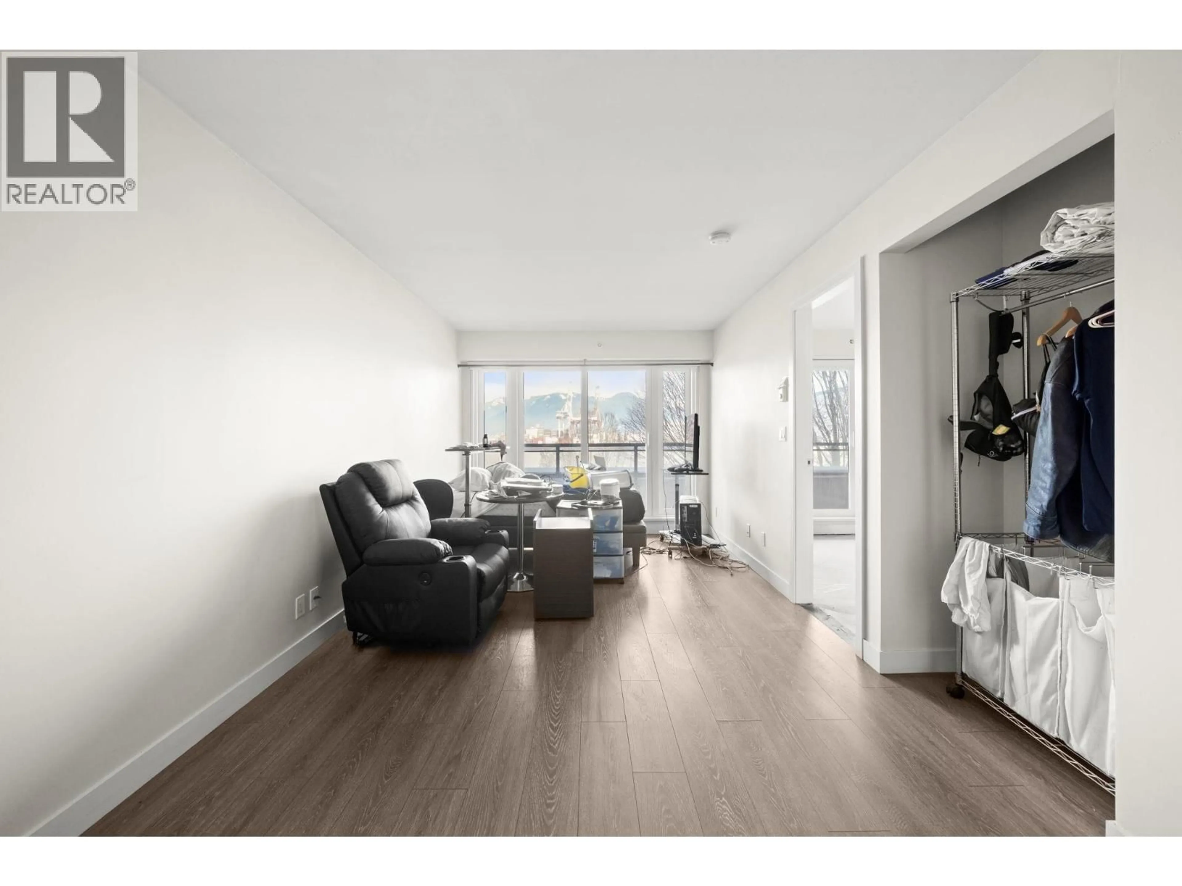 Living room with furniture, wood/laminate floor for 419 - 1588 HASTINGS STREET, Vancouver British Columbia V5L0B8