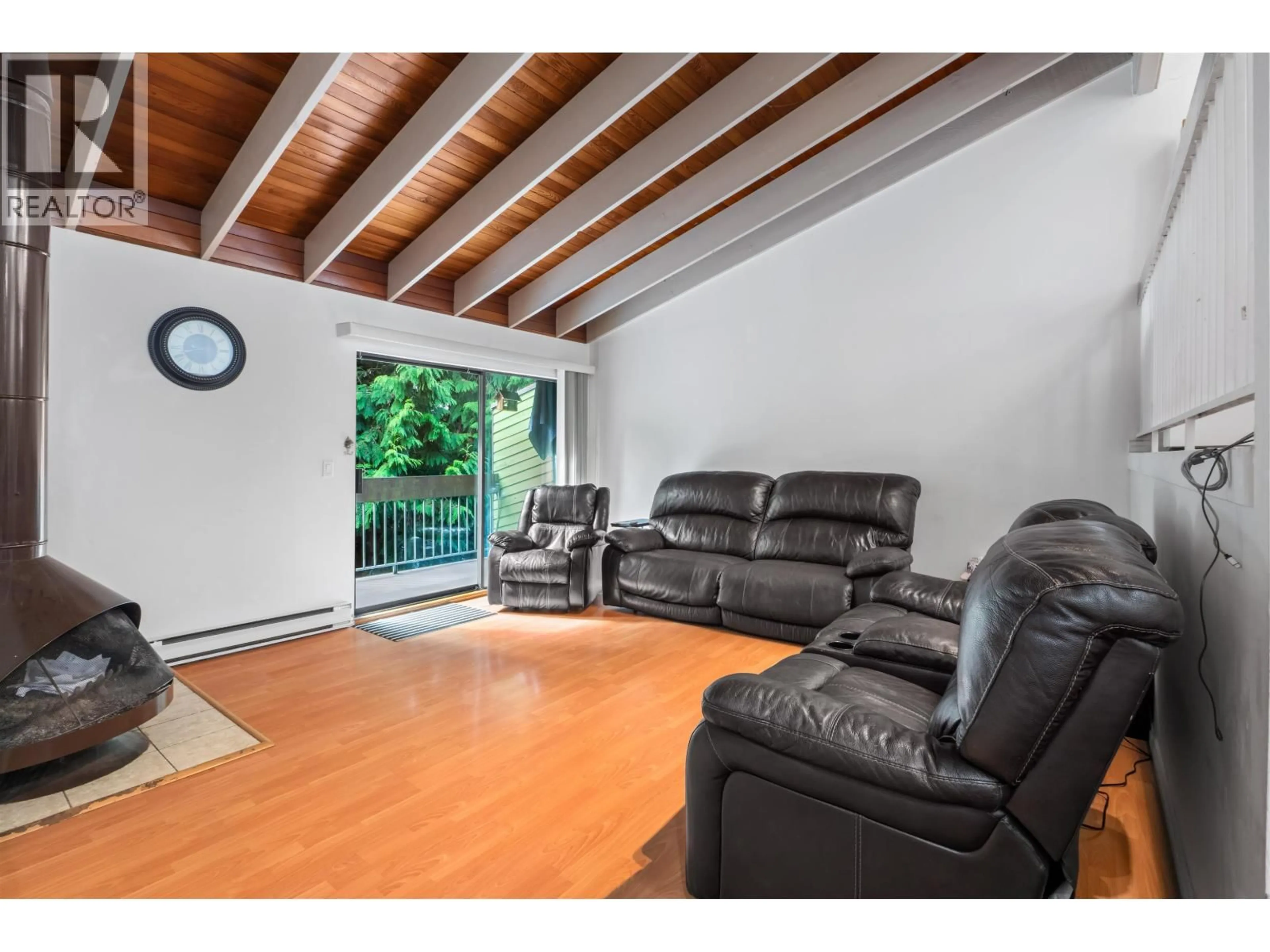 Living room with furniture, wood/laminate floor for 2690 KINGSFORD AVENUE, Burnaby British Columbia V5B4L6