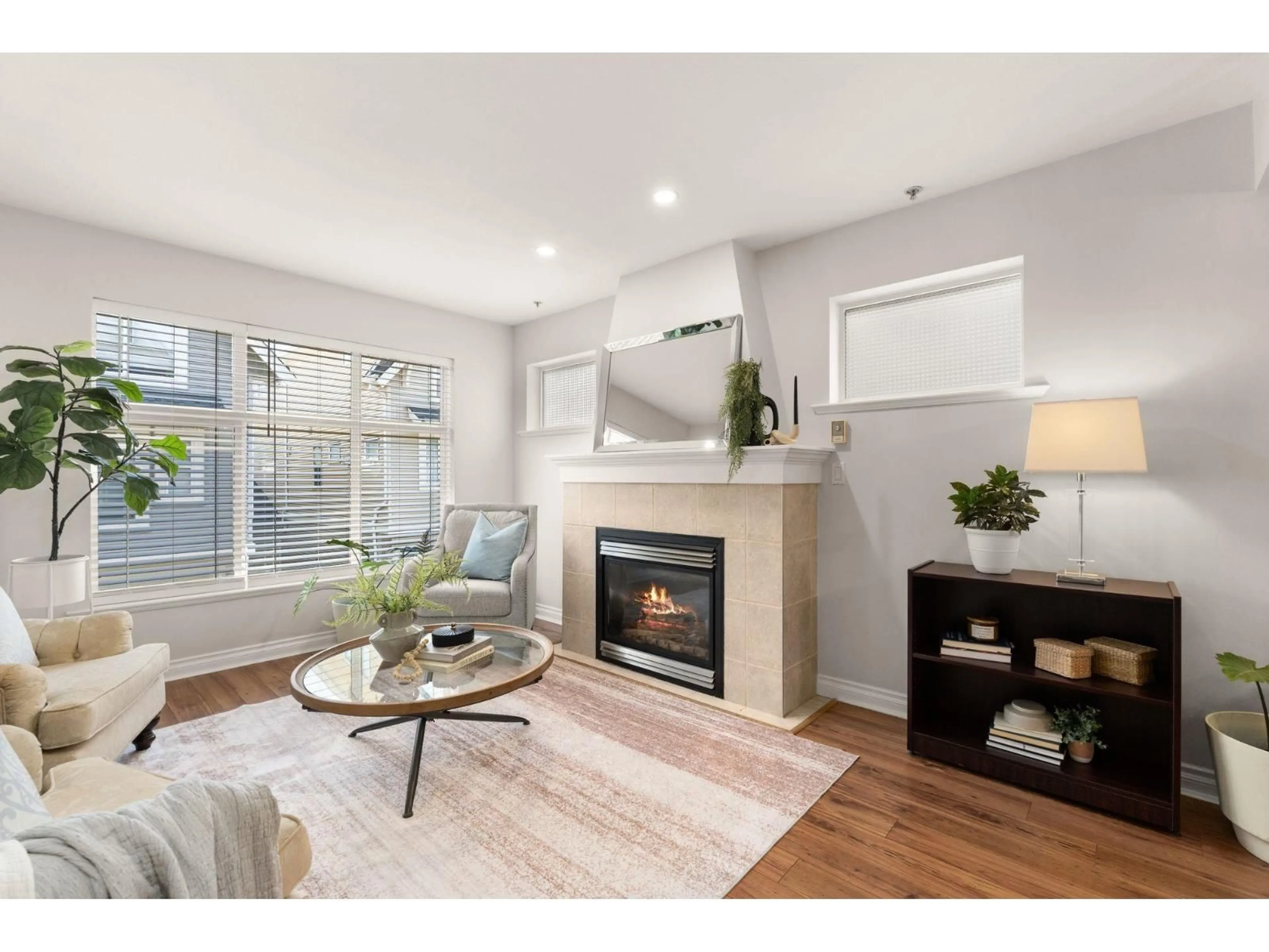 Living room with furniture, wood/laminate floor for 36 - 6450 199 STREET, Langley British Columbia V2Y2X1