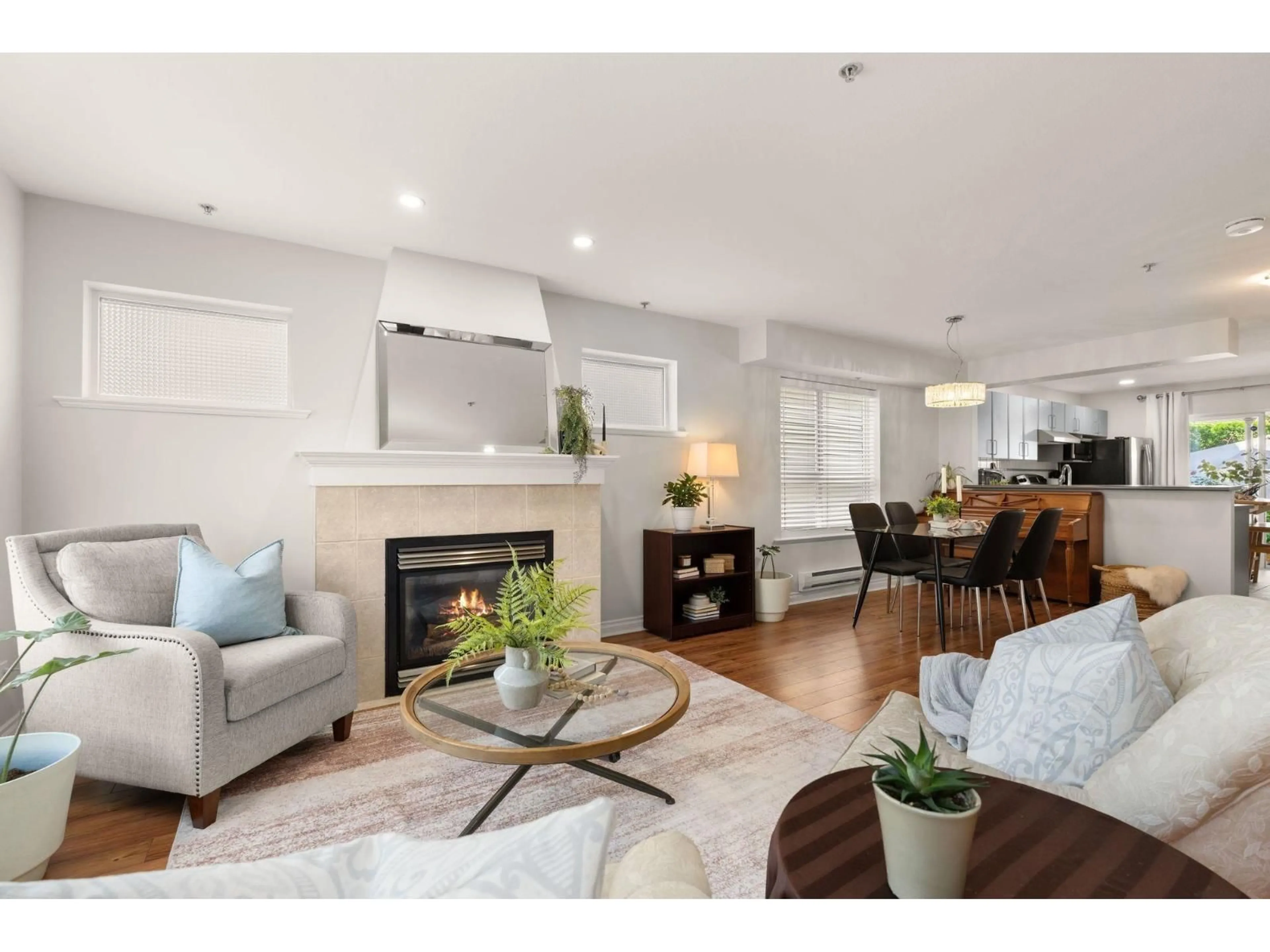 Living room with furniture, wood/laminate floor for 36 - 6450 199 STREET, Langley British Columbia V2Y2X1