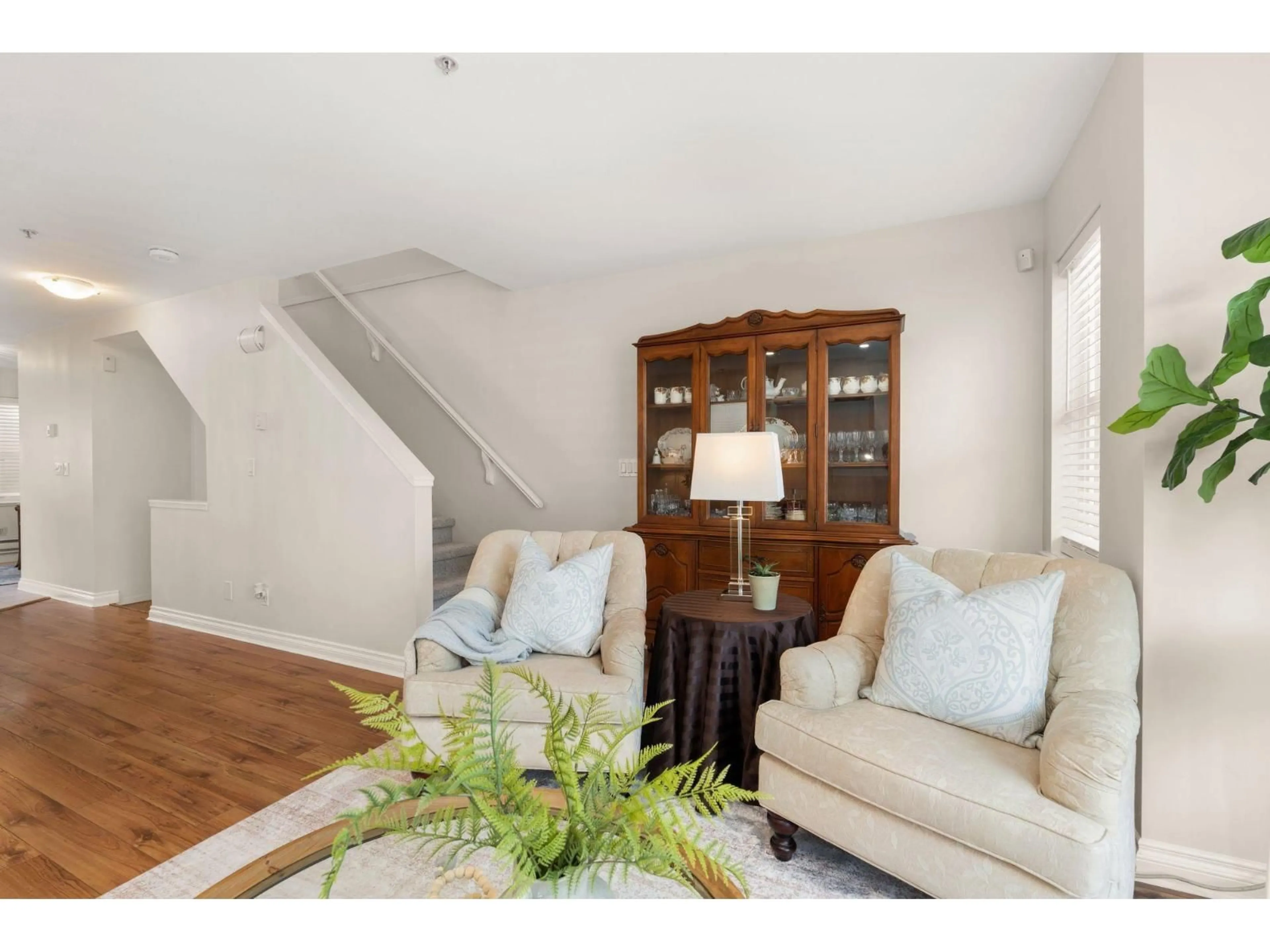 Living room with furniture, wood/laminate floor for 36 - 6450 199 STREET, Langley British Columbia V2Y2X1