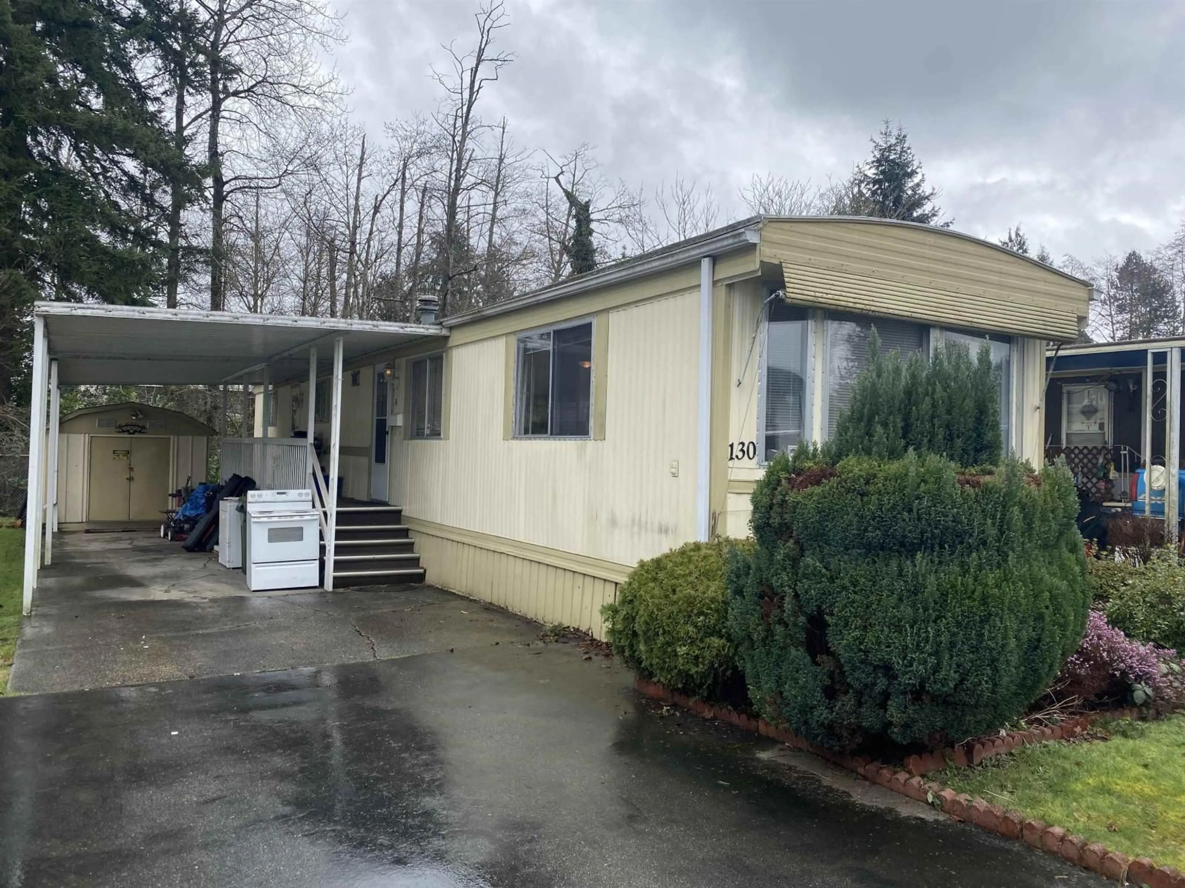 Home with vinyl exterior material, street for 130 - 7790 KING GEORGE BOULEVARD, Surrey British Columbia V3W5Y4