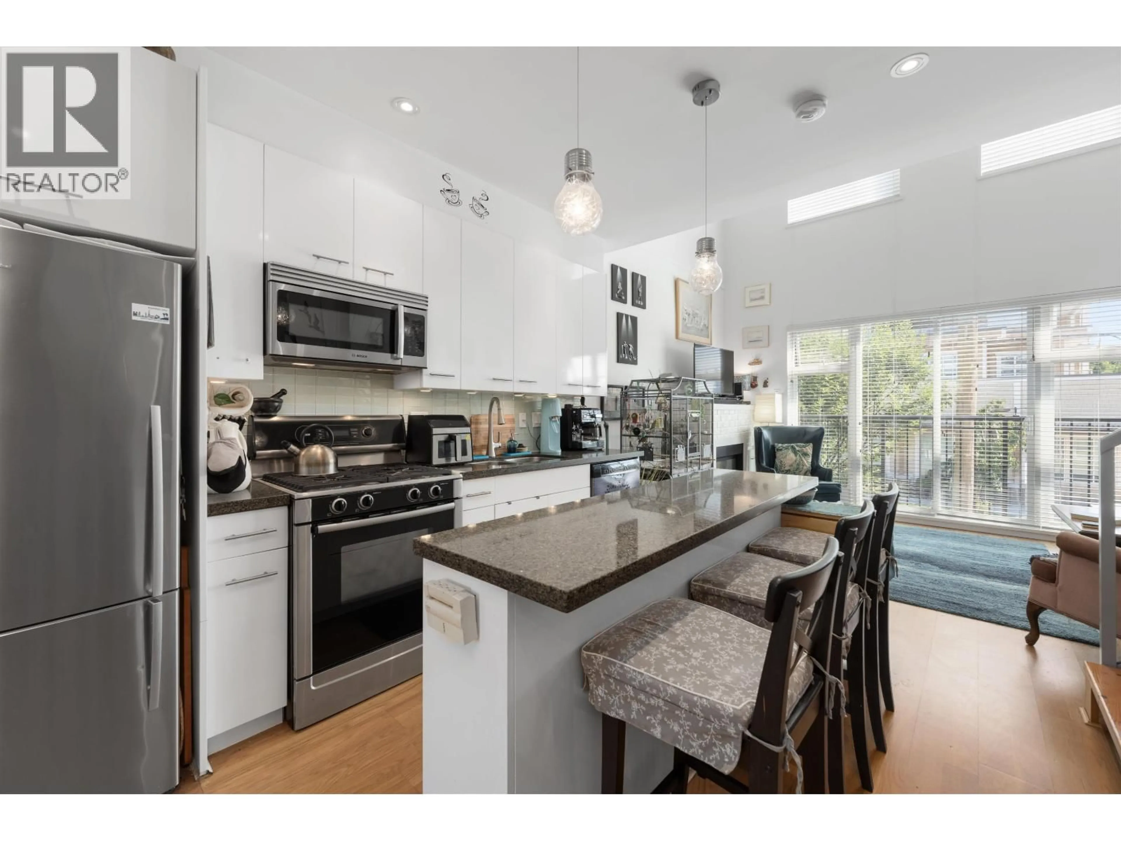 Open concept kitchen, ceramic/tile floor for 5 - 3993 CHATHAM STREET, Richmond British Columbia V7E2Z6