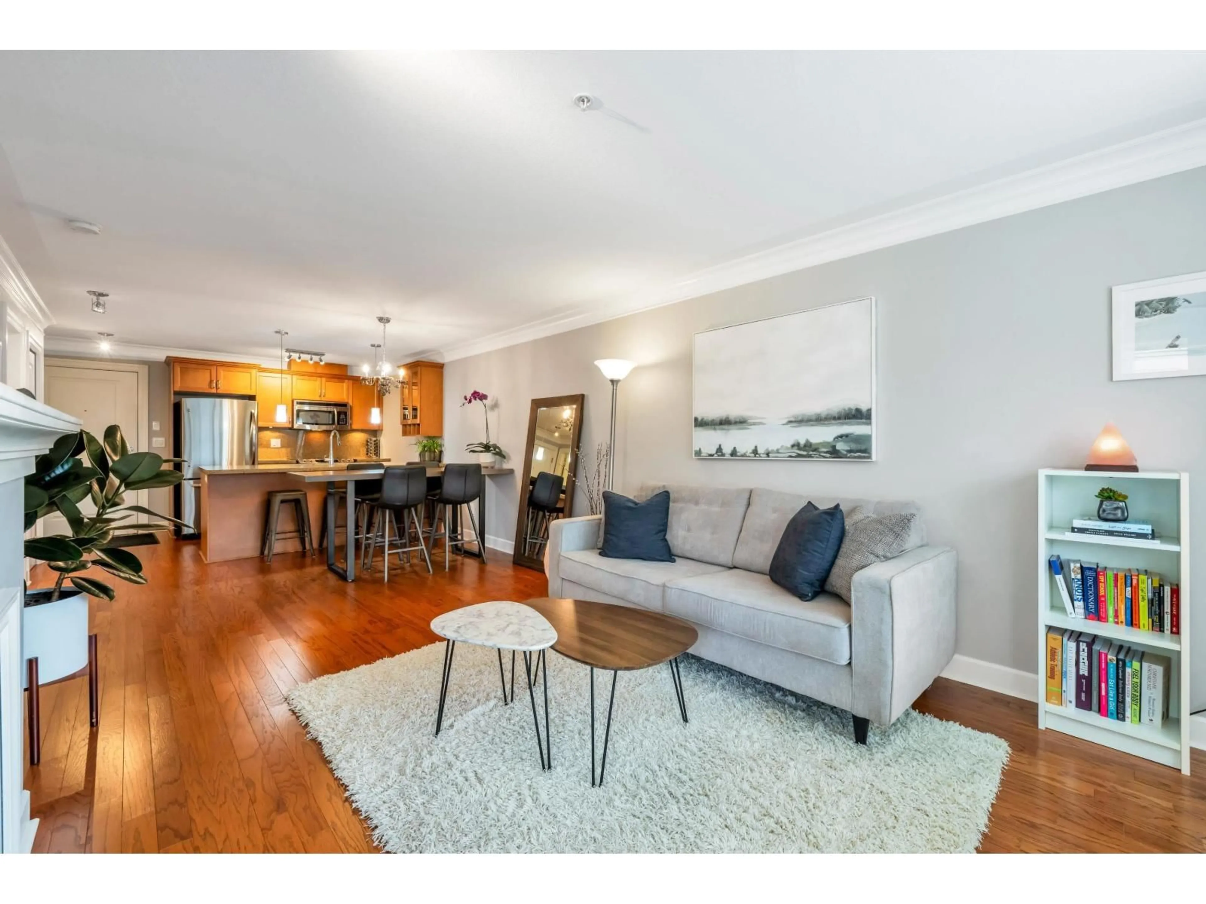 Living room with furniture, wood/laminate floor for 206 - 15357 ROPER AVENUE, White Rock British Columbia V4B2G2