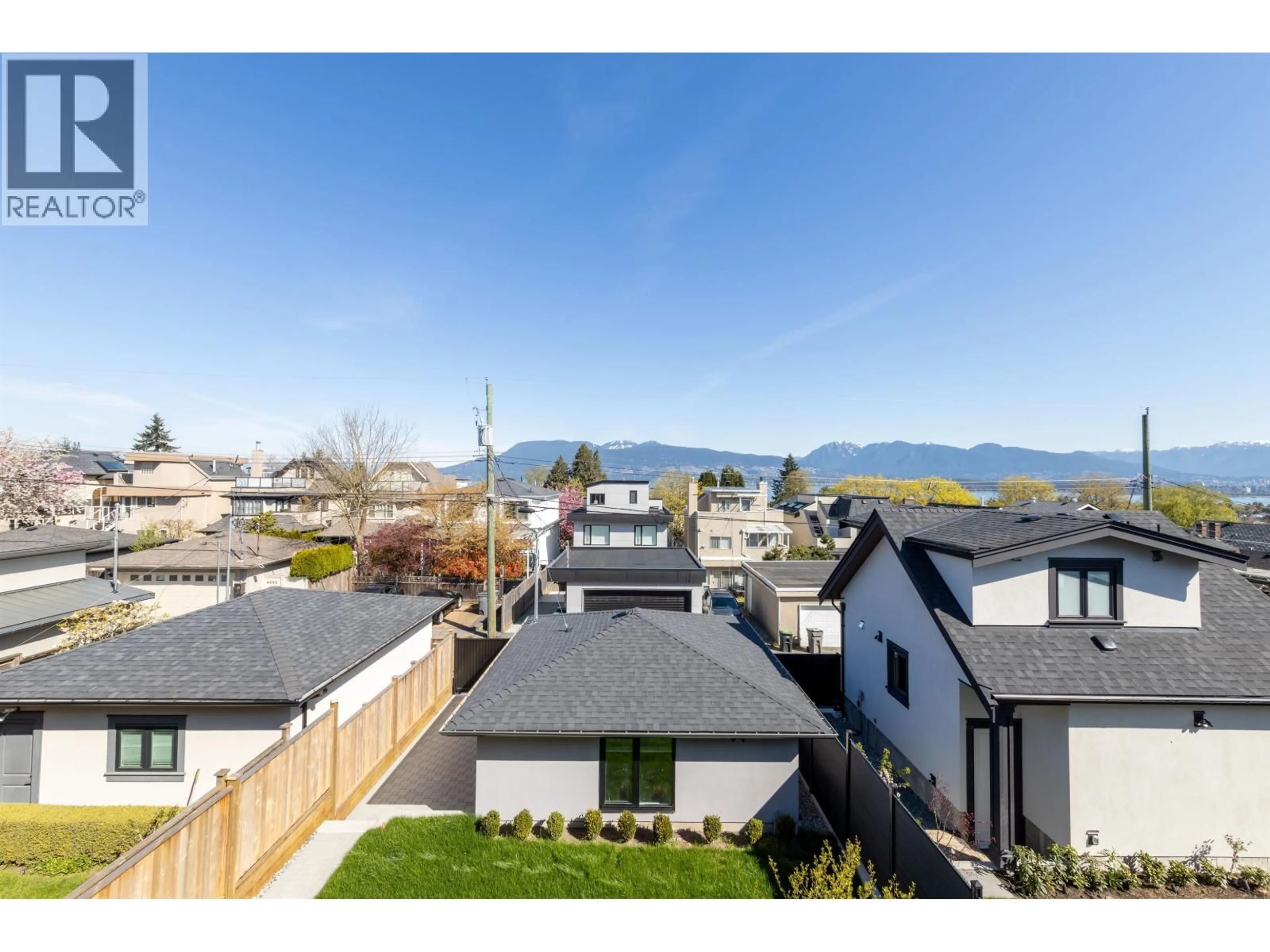 A pic from outside/outdoor area/front of a property/back of a property/a pic from drone, mountain view for 4039 11TH AVENUE, Vancouver British Columbia V6R2L6