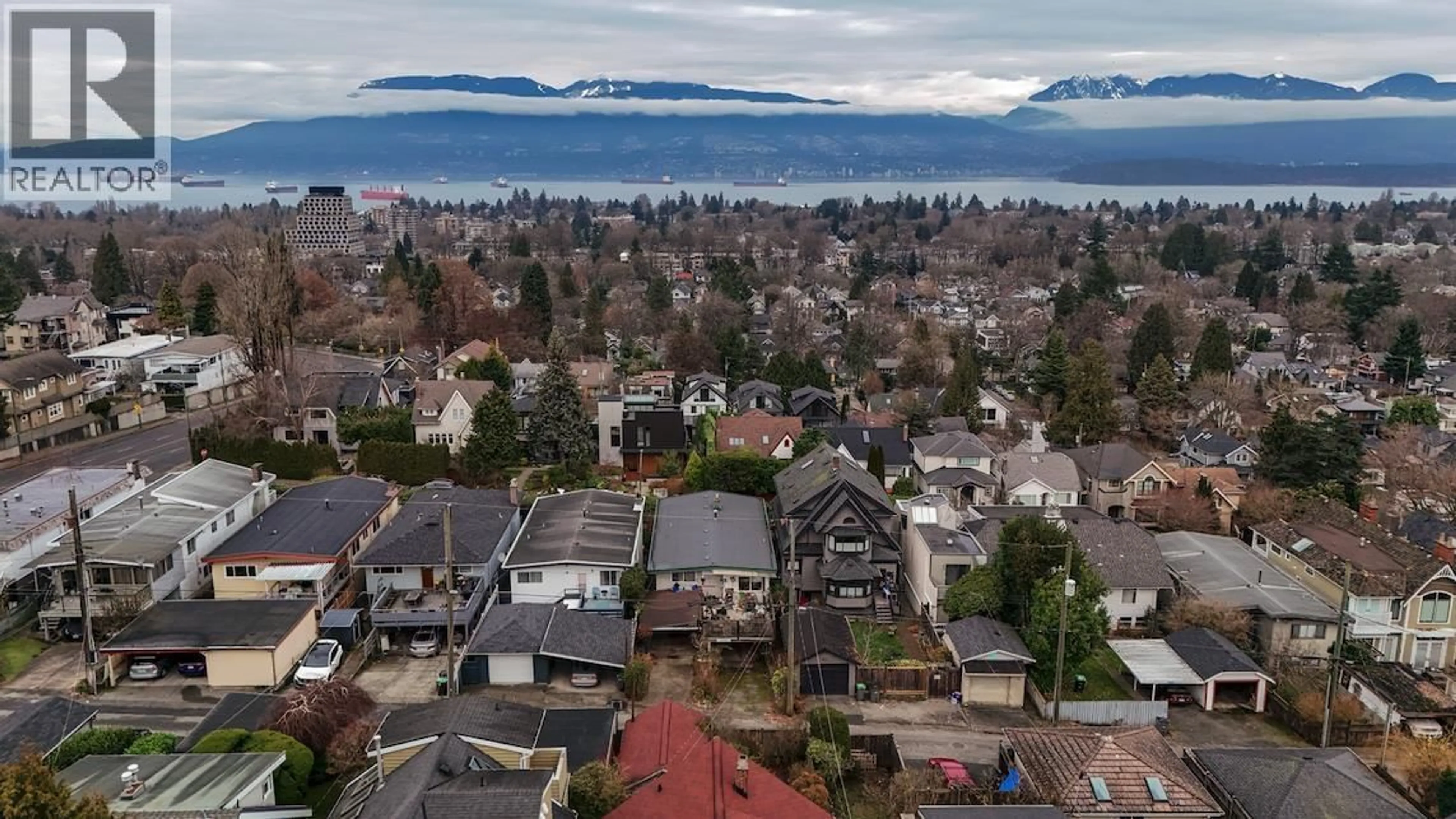 A pic from outside/outdoor area/front of a property/back of a property/a pic from drone, mountain view for 3558 15TH AVENUE, Vancouver British Columbia V6R2Z4