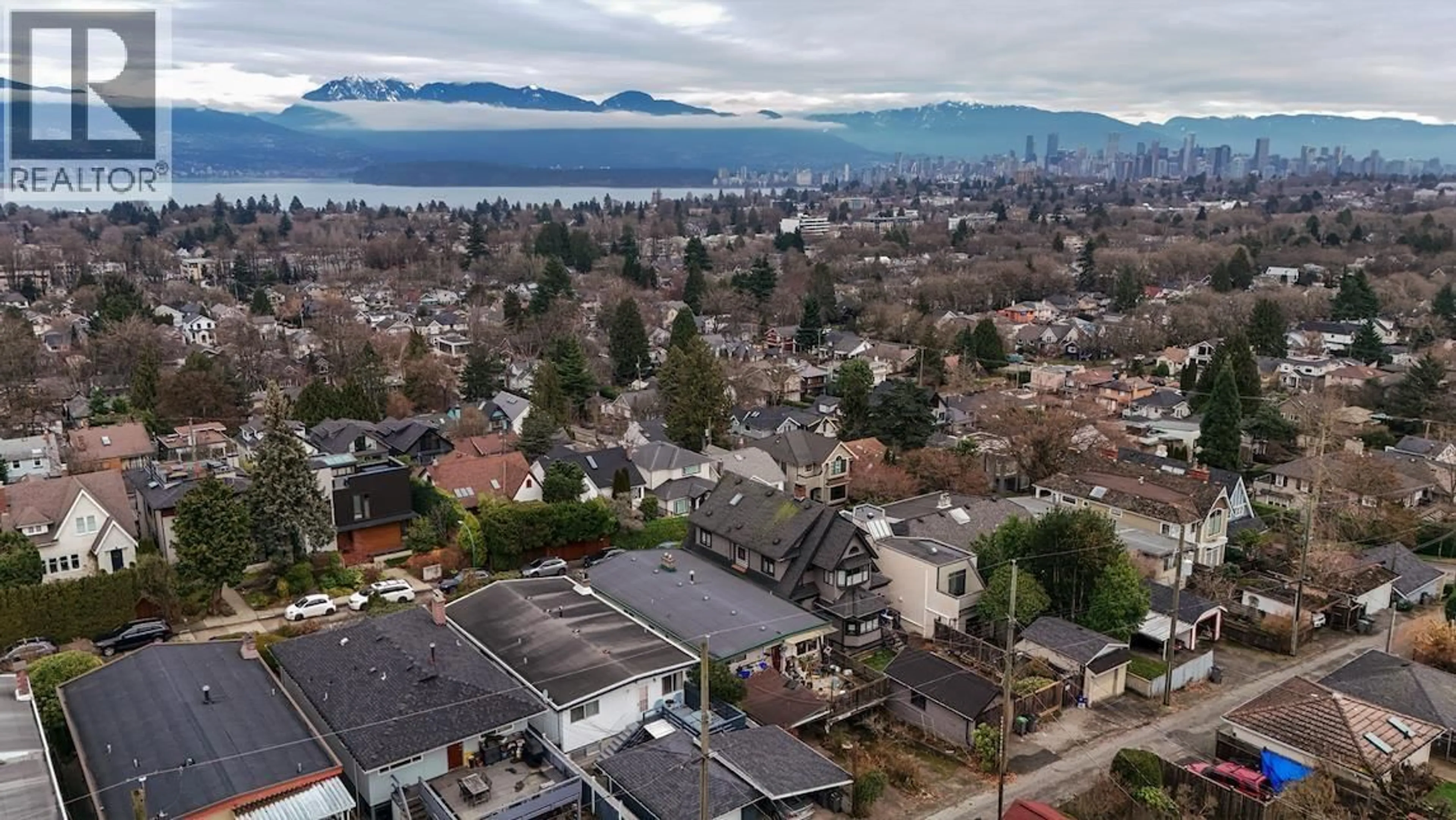 A pic from outside/outdoor area/front of a property/back of a property/a pic from drone, mountain view for 3558 15TH AVENUE, Vancouver British Columbia V6R2Z4