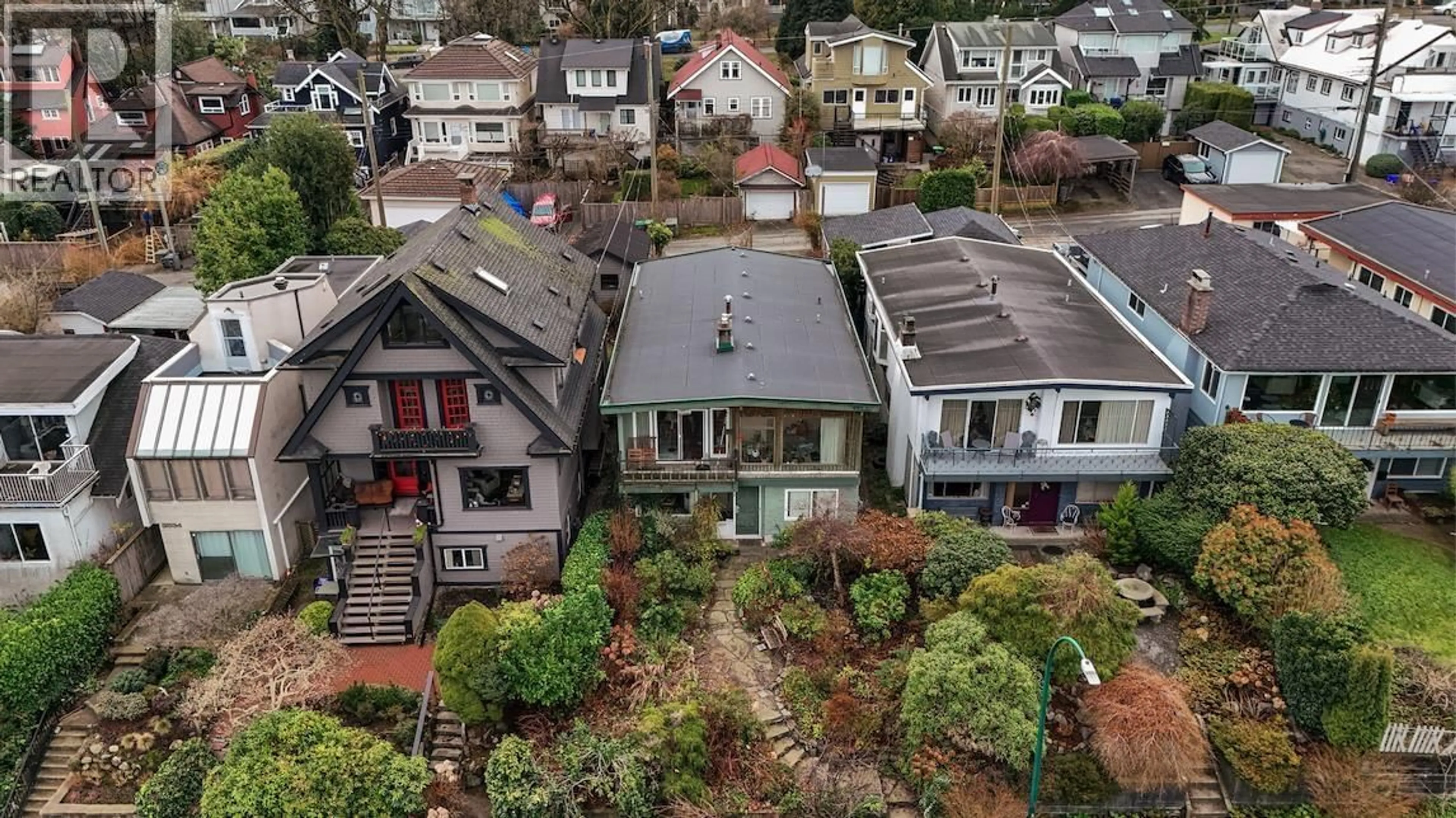 A pic from outside/outdoor area/front of a property/back of a property/a pic from drone, street for 3558 15TH AVENUE, Vancouver British Columbia V6R2Z4