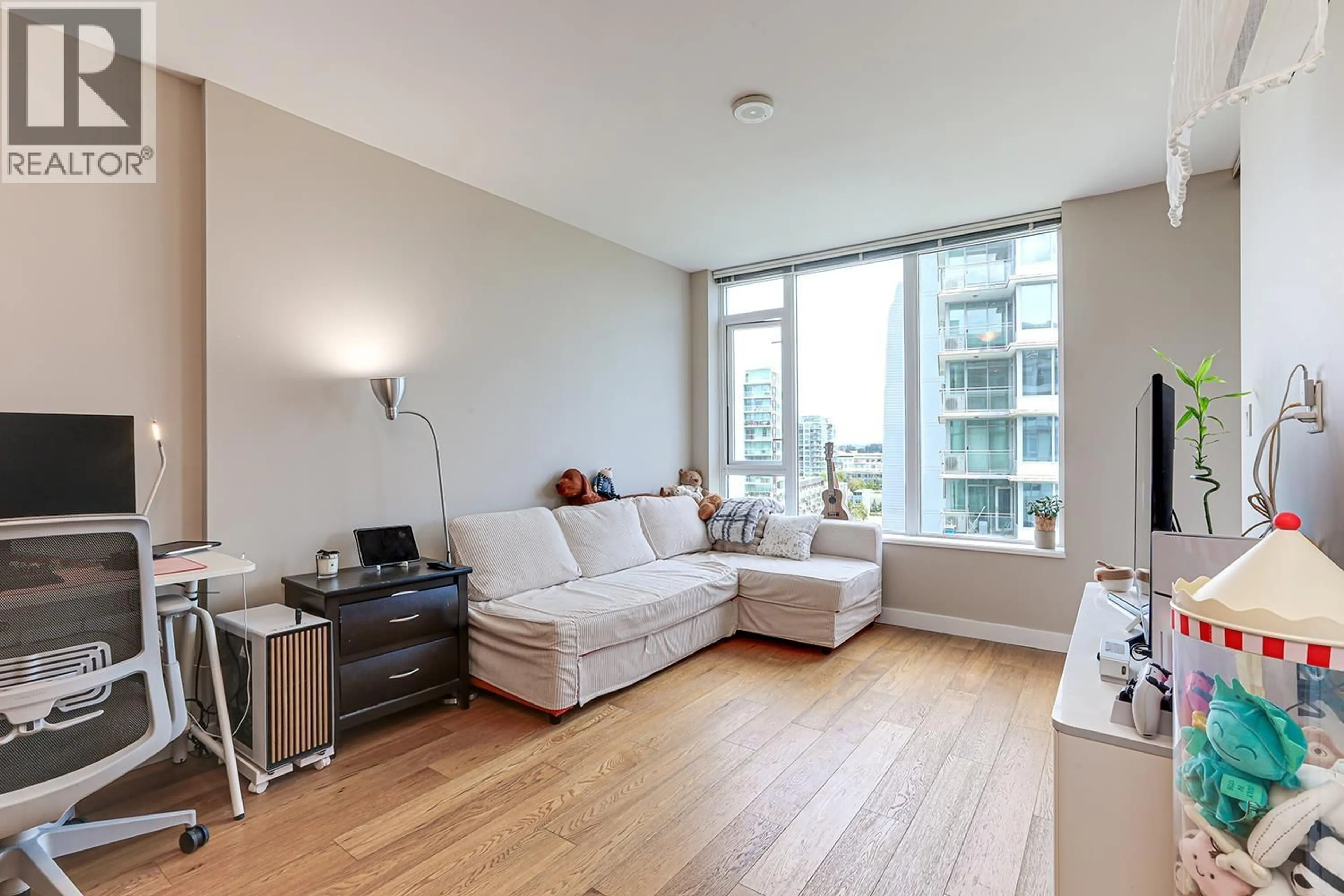 Living room with furniture, wood/laminate floor for 1001 - 6951 ELMBRIDGE WAY, Richmond British Columbia V6X1X5