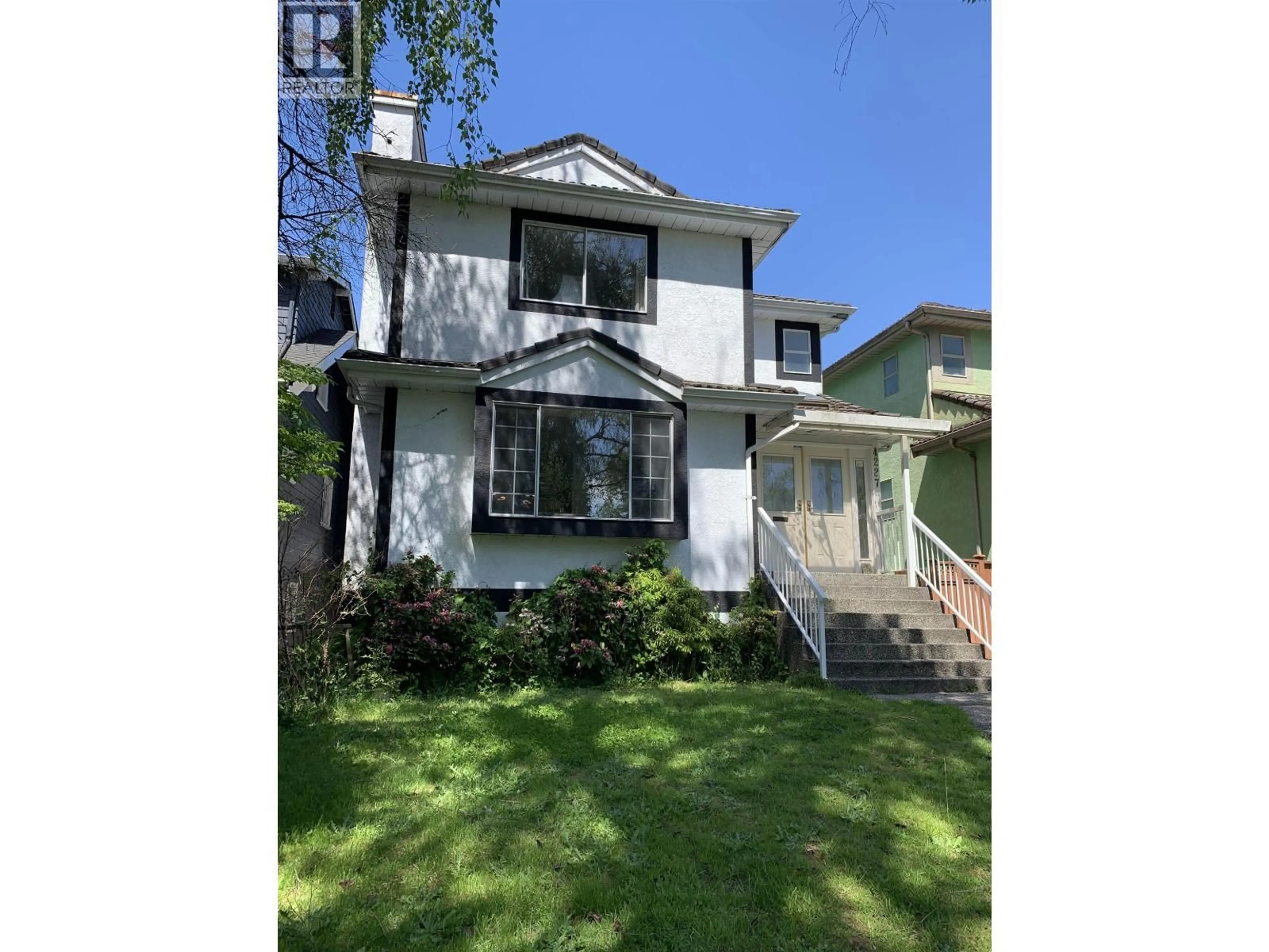 A pic from outside/outdoor area/front of a property/back of a property/a pic from drone, street for 4227 14TH AVENUE, Vancouver British Columbia V6R2X7