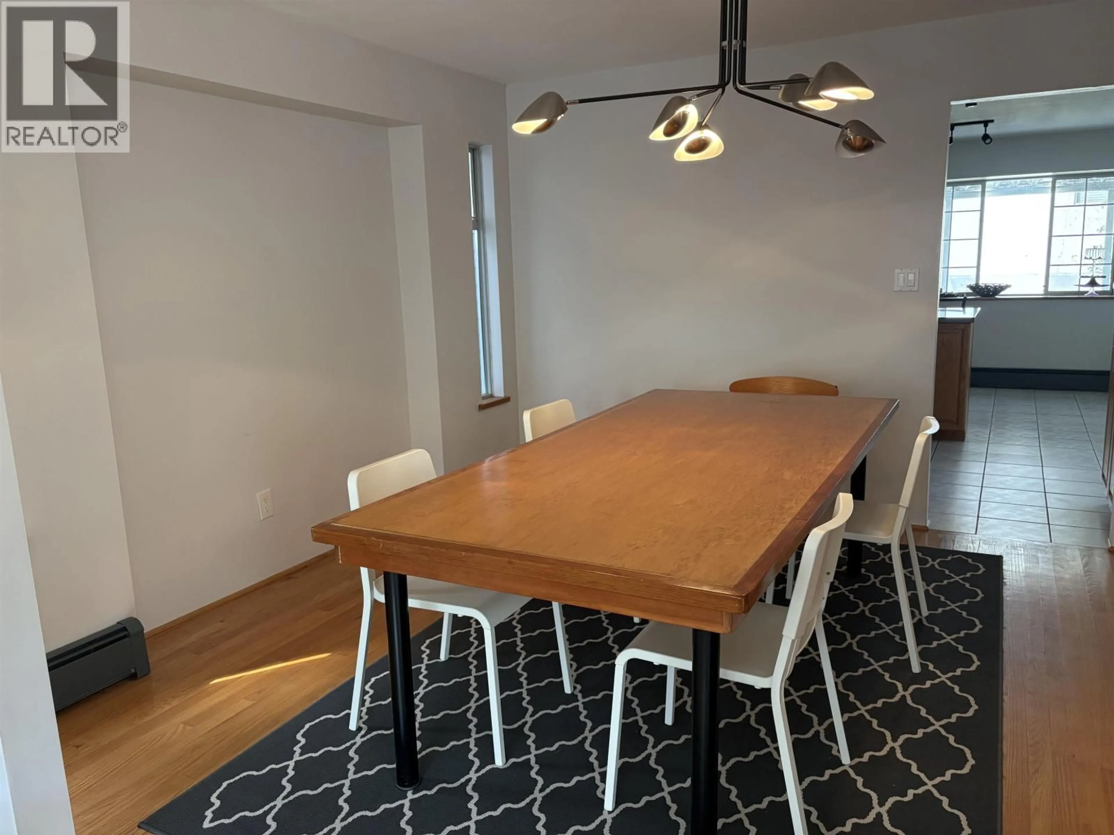 Dining room, wood/laminate floor for 4227 14TH AVENUE, Vancouver British Columbia V6R2X7