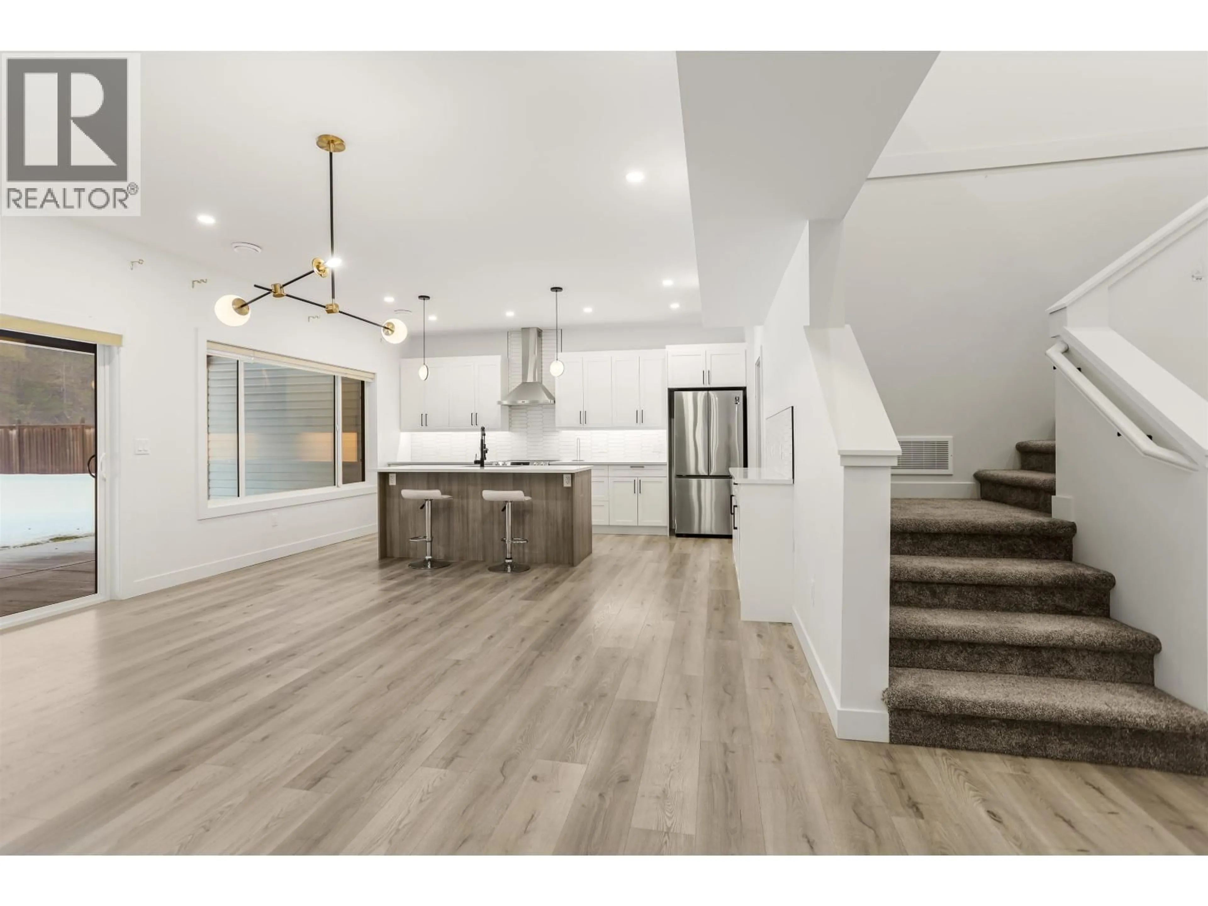 Open concept kitchen, wood/laminate floor for 5224 SMITH AVENUE, Terrace British Columbia V8G0H1