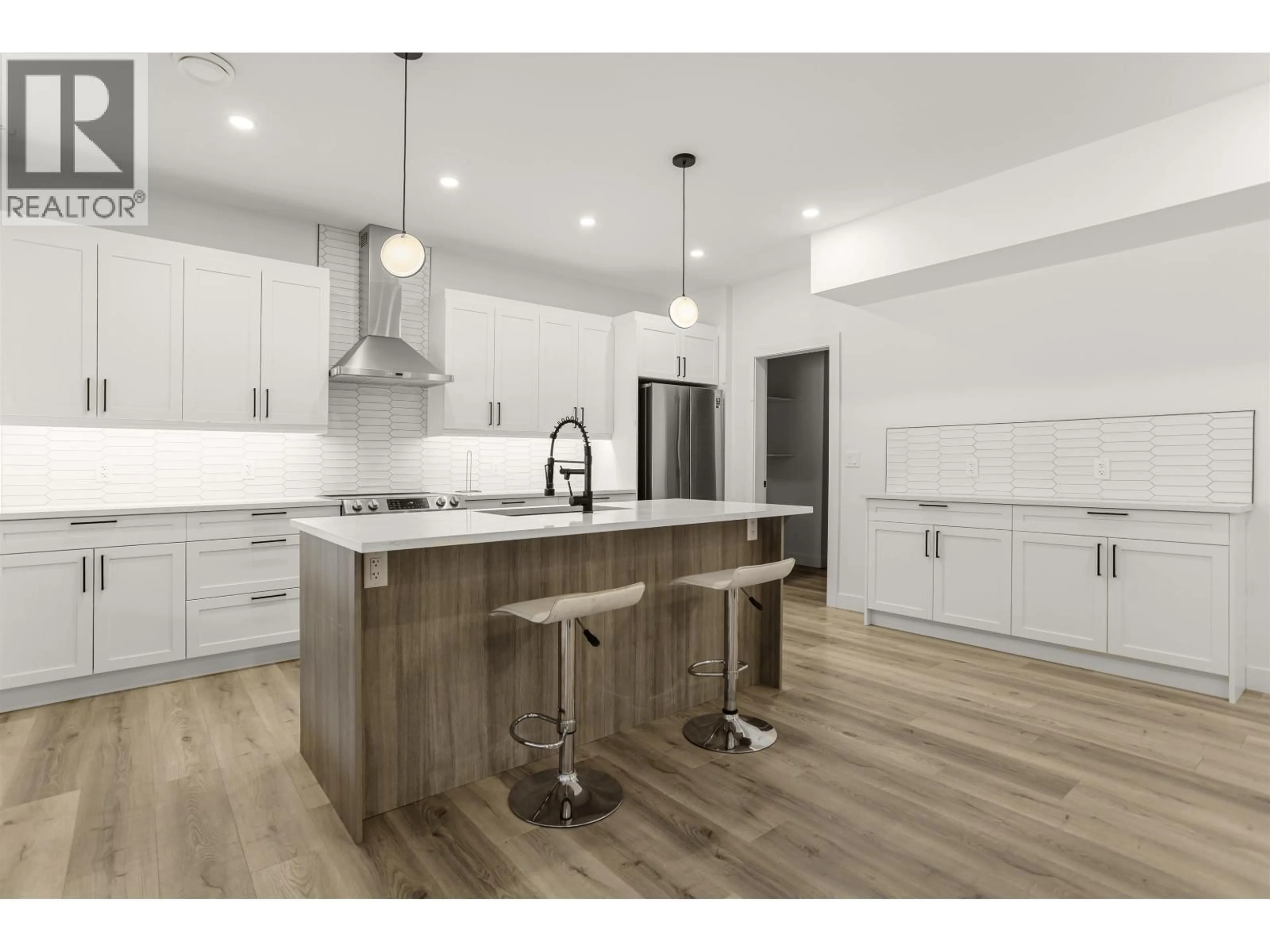 Open concept kitchen, wood/laminate floor for 5224 SMITH AVENUE, Terrace British Columbia V8G0H1