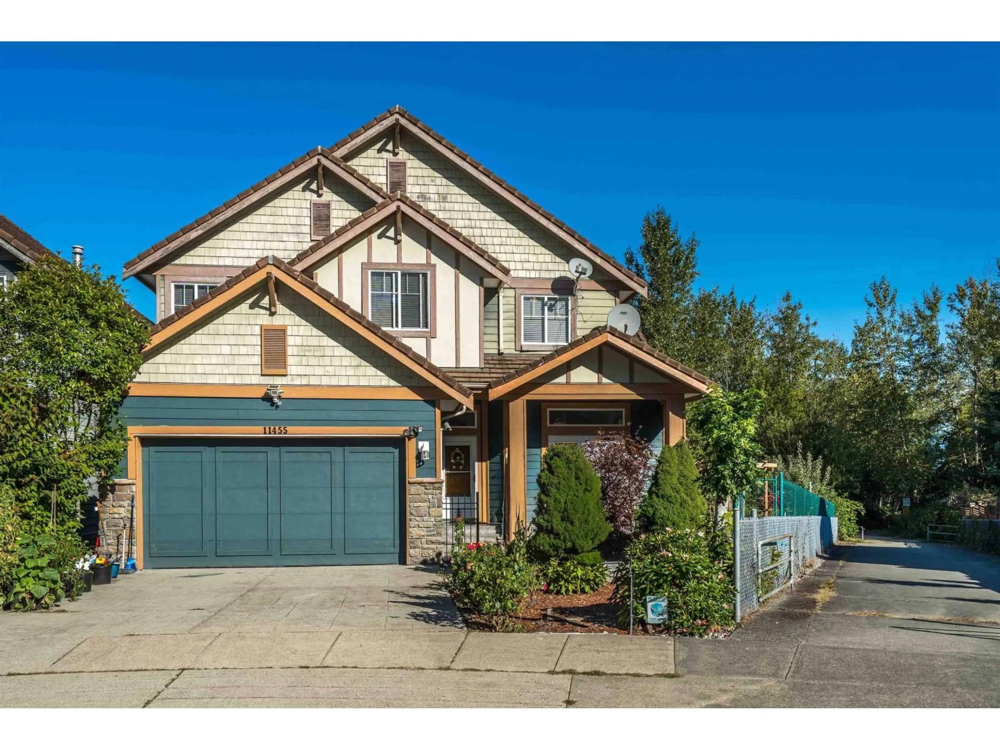 Home with vinyl exterior material, street for 11455 154A STREET, Surrey British Columbia V3R2V7