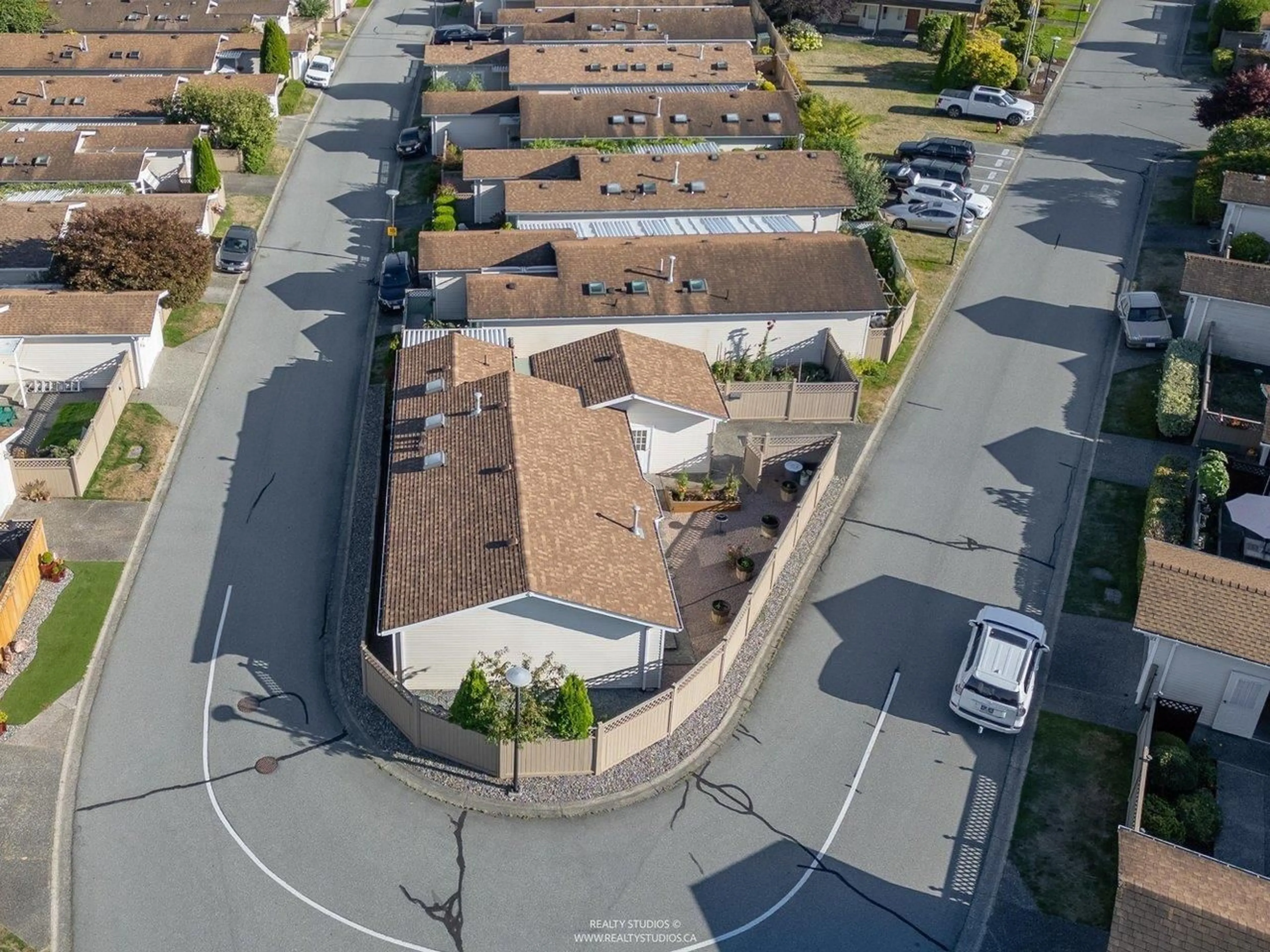 A pic from outside/outdoor area/front of a property/back of a property/a pic from drone, street for 59 - 1400 164 STREET, Surrey British Columbia V4A8V7