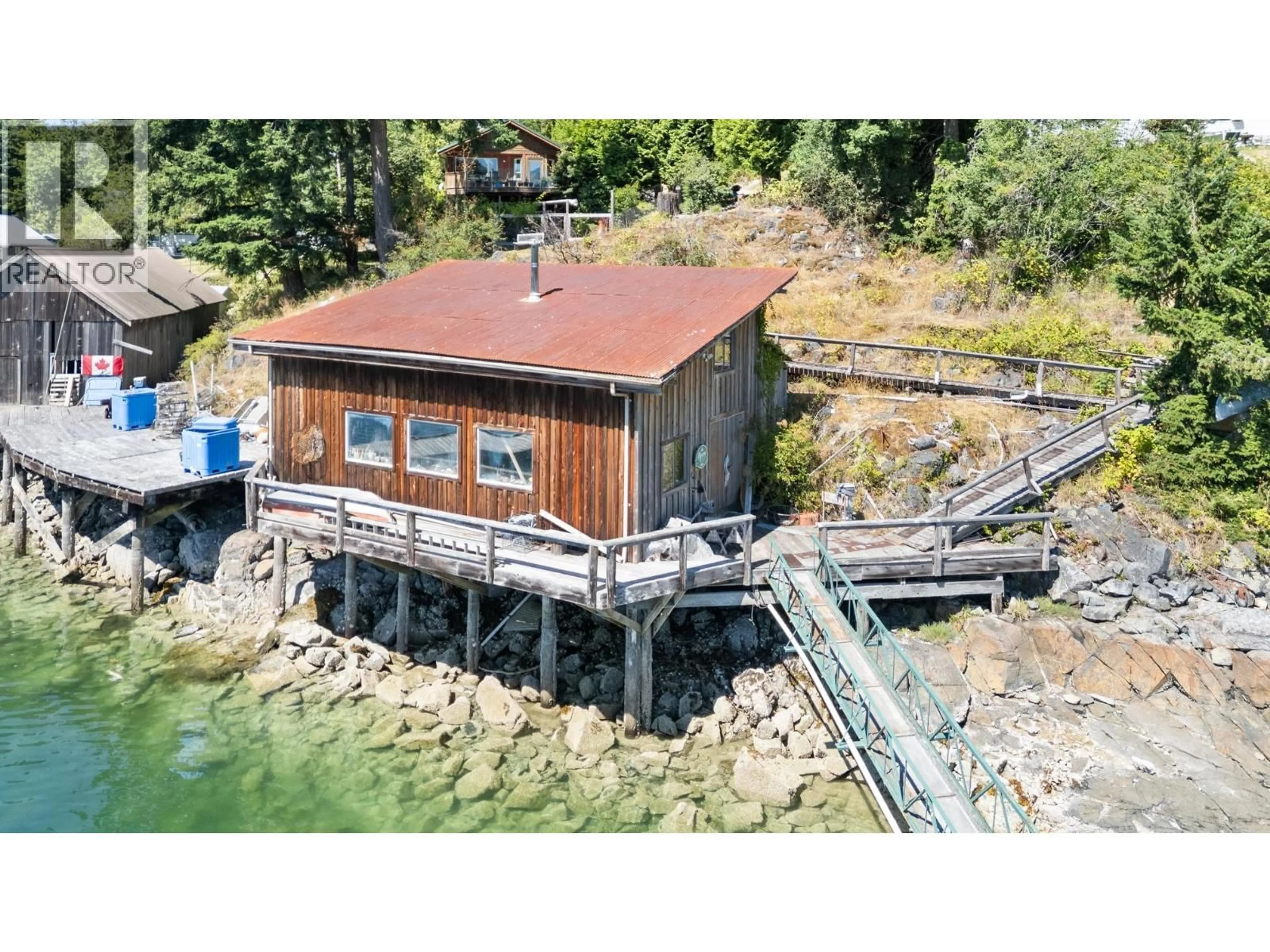 A pic from outside/outdoor area/front of a property/back of a property/a pic from drone, water/lake/river/ocean view for 4371 FRANCIS PENINSULA ROAD, Madeira Park British Columbia V0N2H1