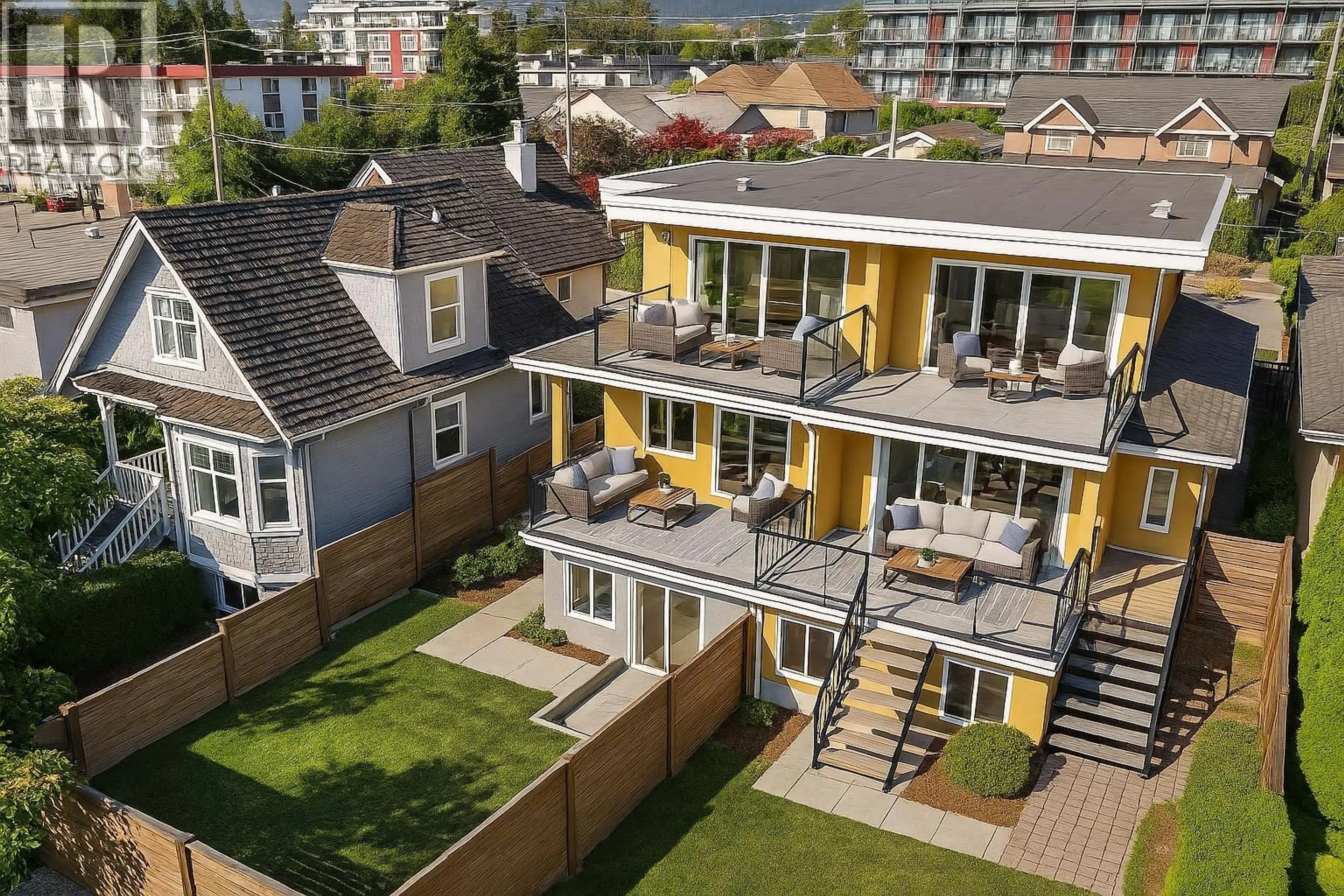 A pic from outside/outdoor area/front of a property/back of a property/a pic from drone, city buildings view from balcony for 412 2ND STREET, North Vancouver British Columbia V7L1C8