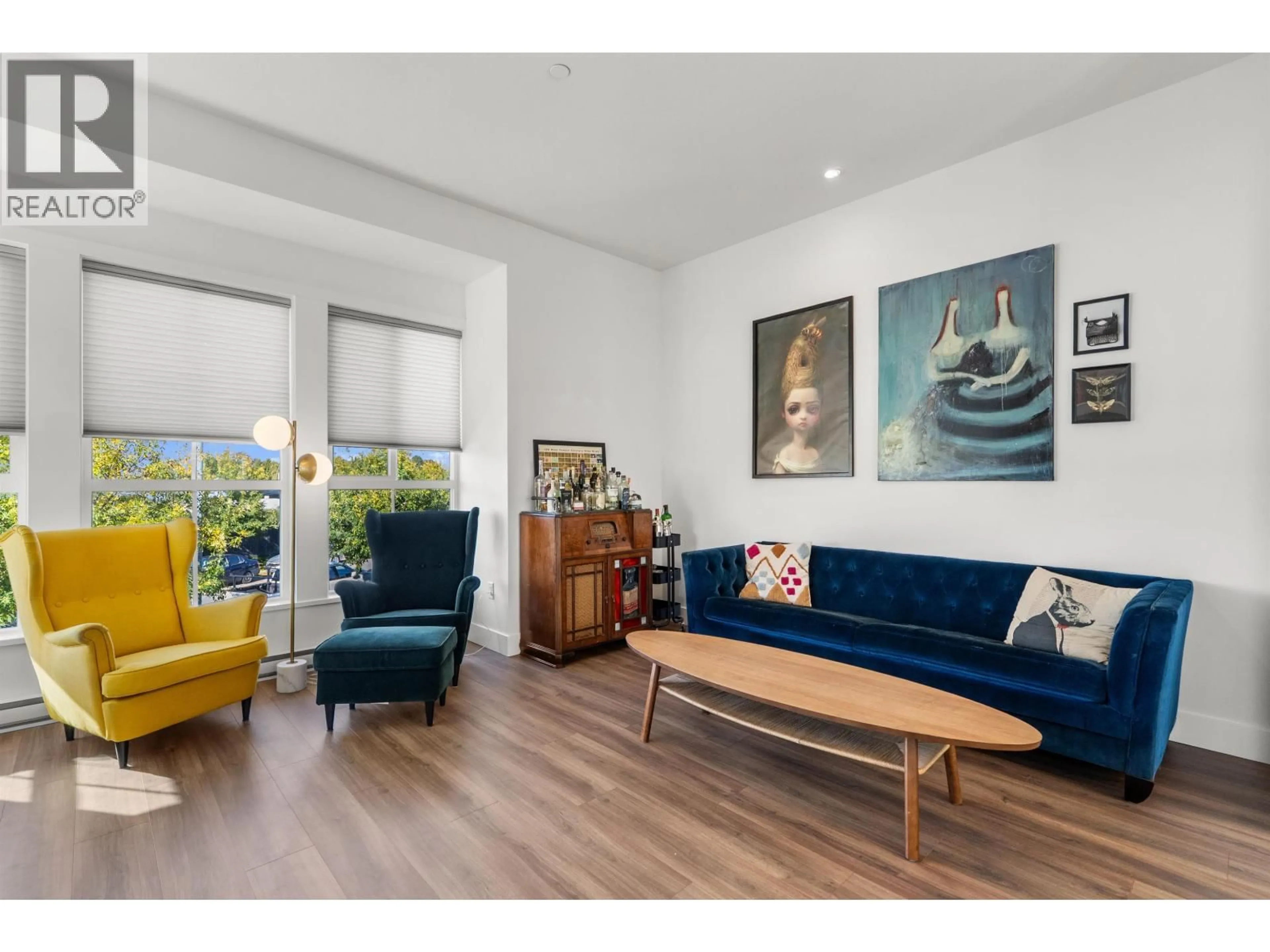 Living room with furniture, wood/laminate floor for 77 - 4656 ORCA WAY, Delta British Columbia V4M0C9