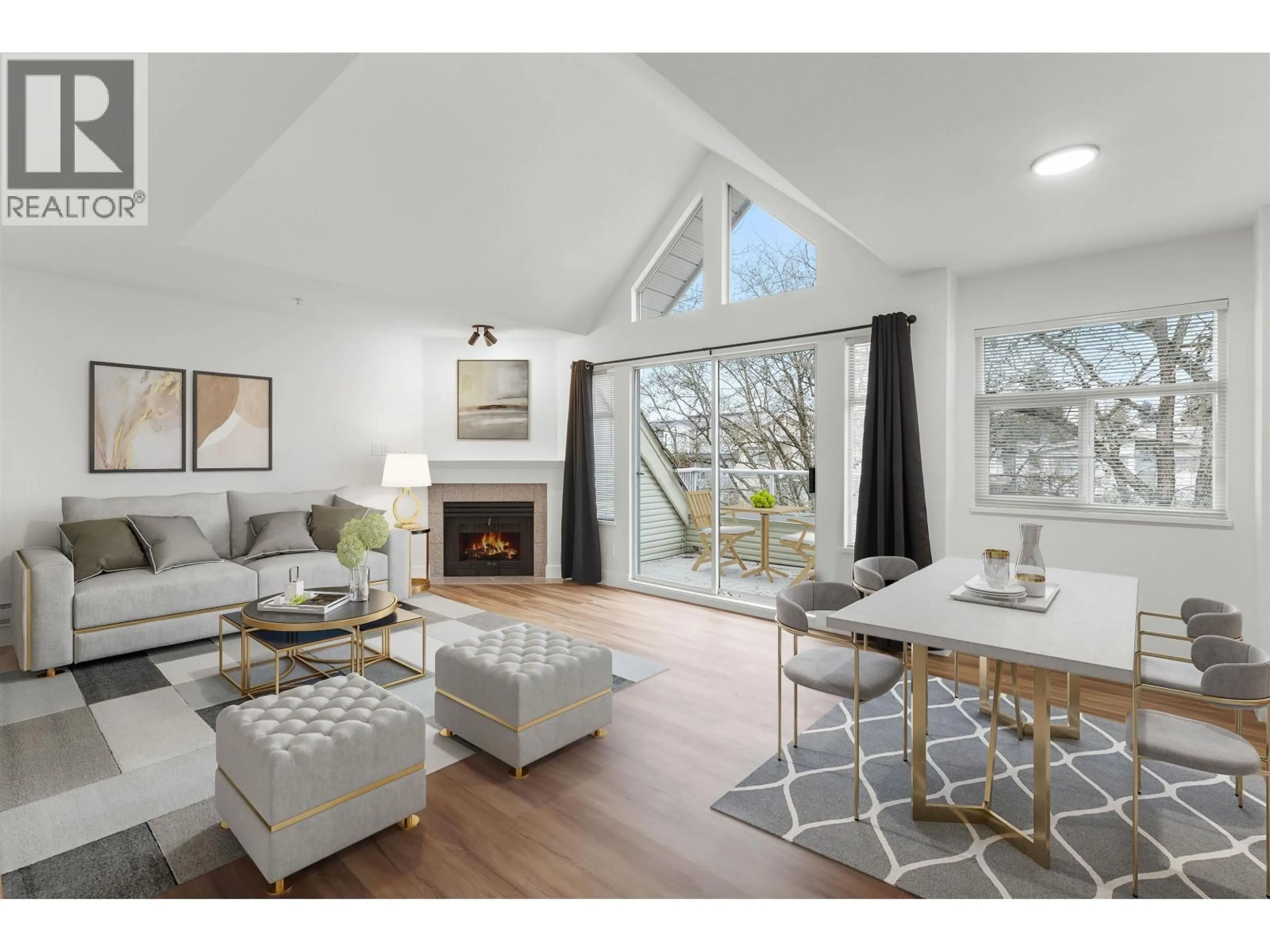 Living room with furniture, wood/laminate floor for 404 - 3638 RAE AVENUE, Vancouver British Columbia V5R2P5