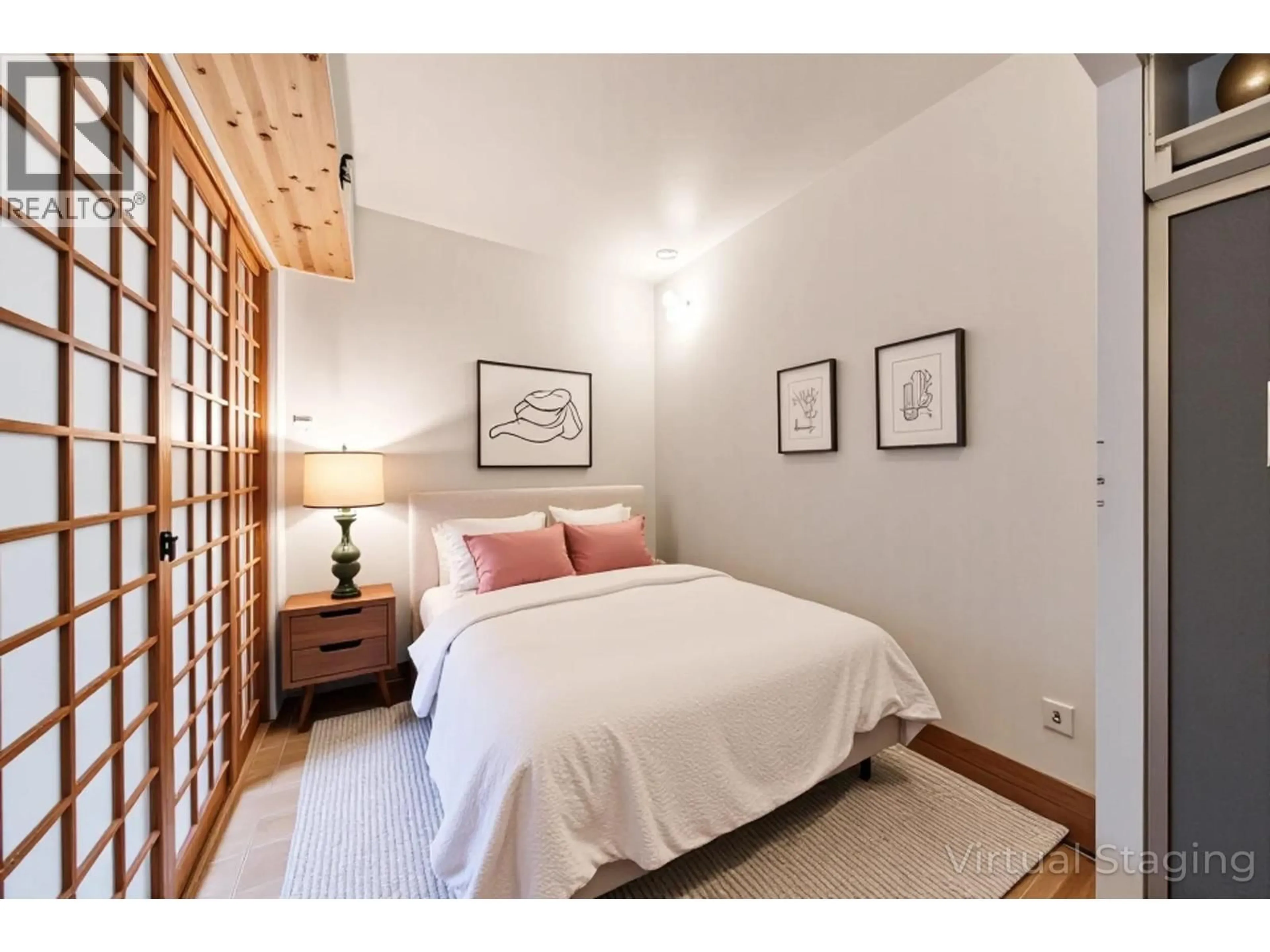 Bedroom with bed, wood/laminate floor for 106 - 1879 BARCLAY STREET, Vancouver British Columbia V6G1K7