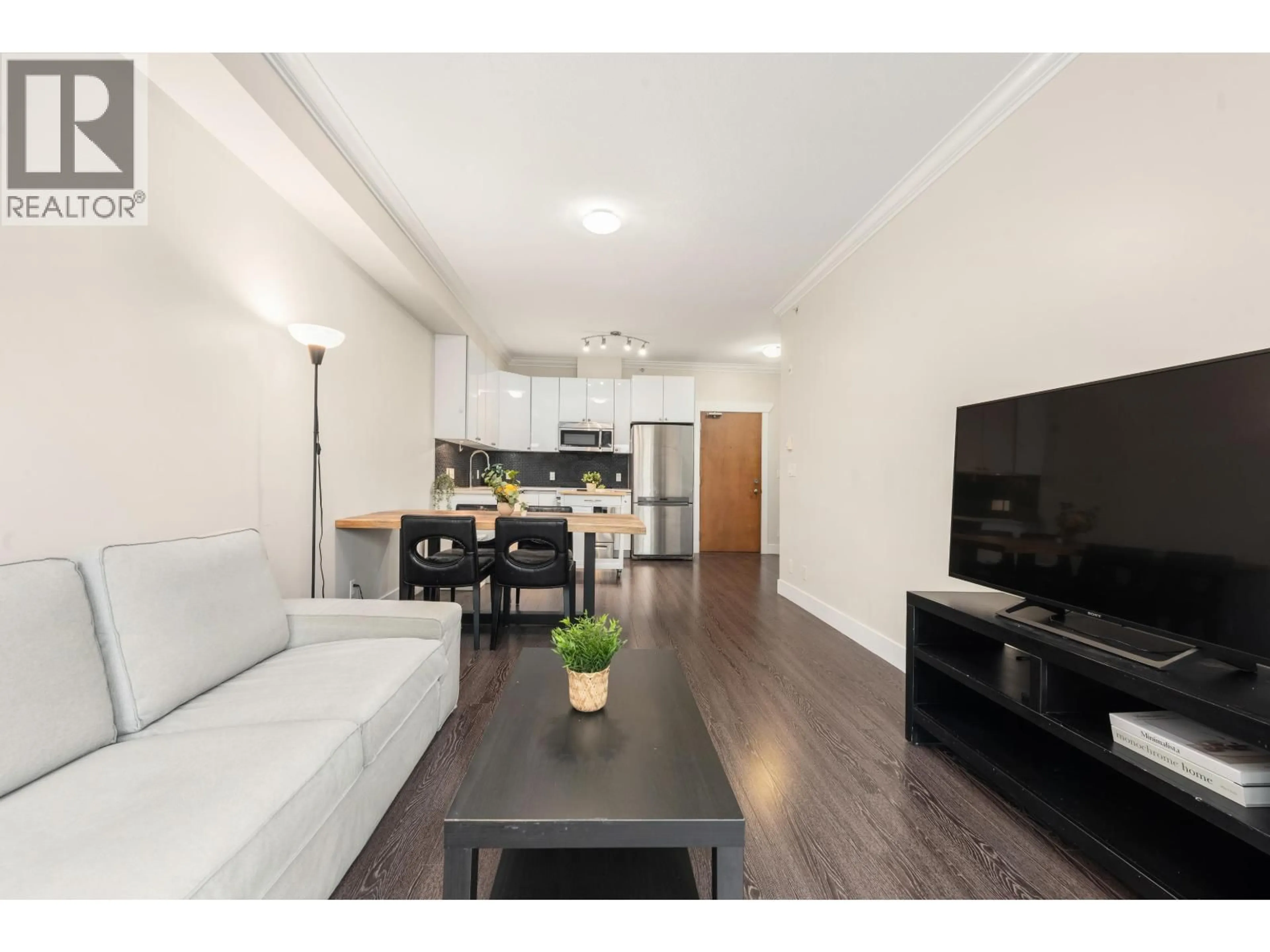 Living room with furniture, wood/laminate floor for 401 - 3437 KINGSWAY, Vancouver British Columbia V5R5L3