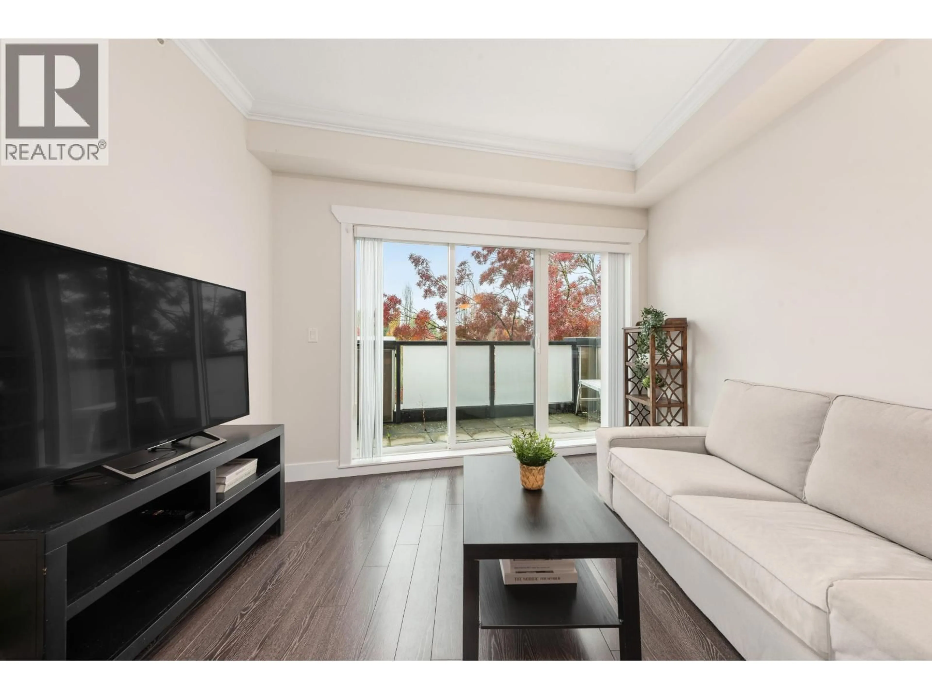 Living room with furniture, wood/laminate floor for 401 - 3437 KINGSWAY, Vancouver British Columbia V5R5L3