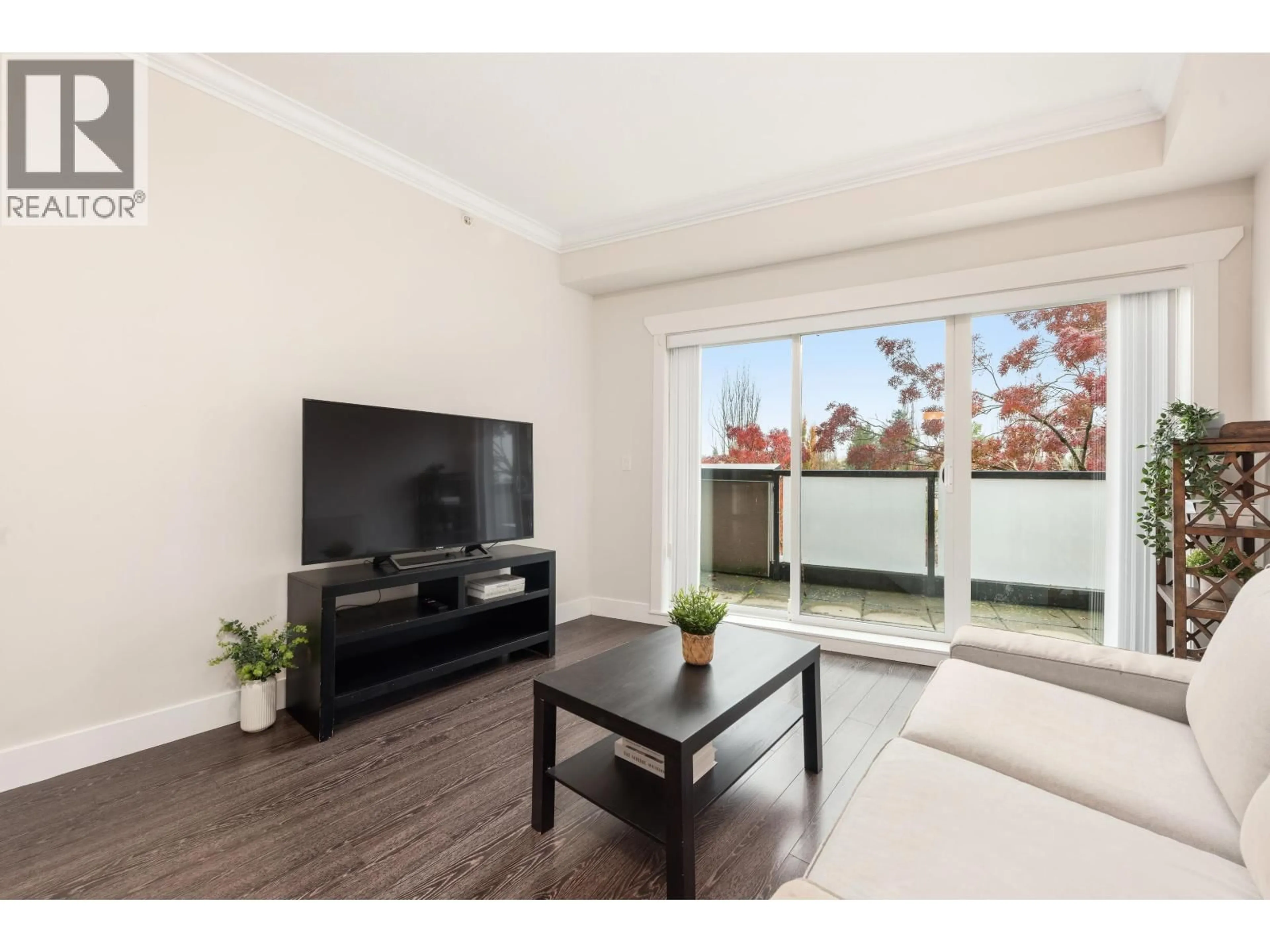 Living room with furniture, wood/laminate floor for 401 - 3437 KINGSWAY, Vancouver British Columbia V5R5L3