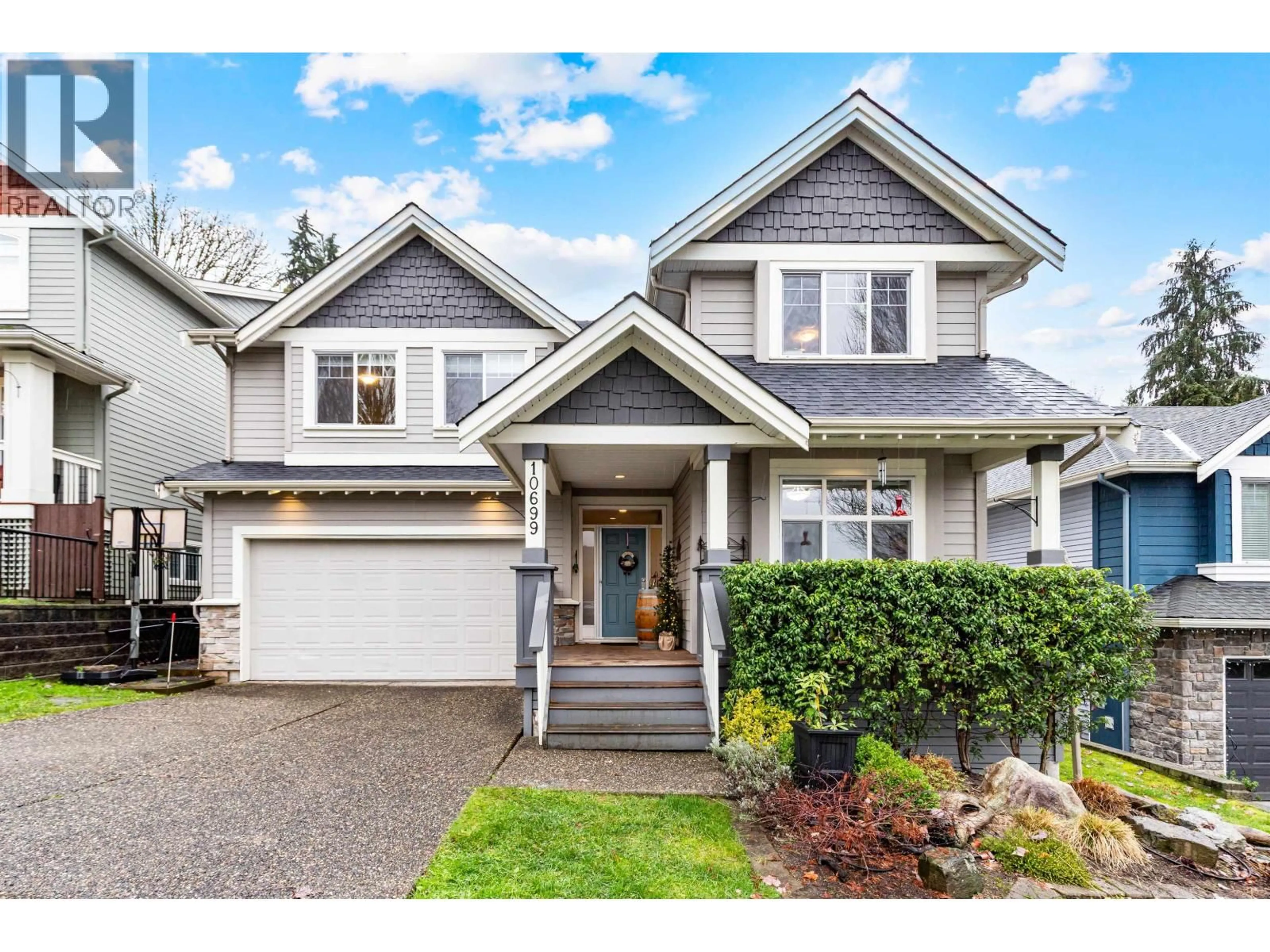 Home with vinyl exterior material, street for 10699 239 STREET, Maple Ridge British Columbia V2W0B3