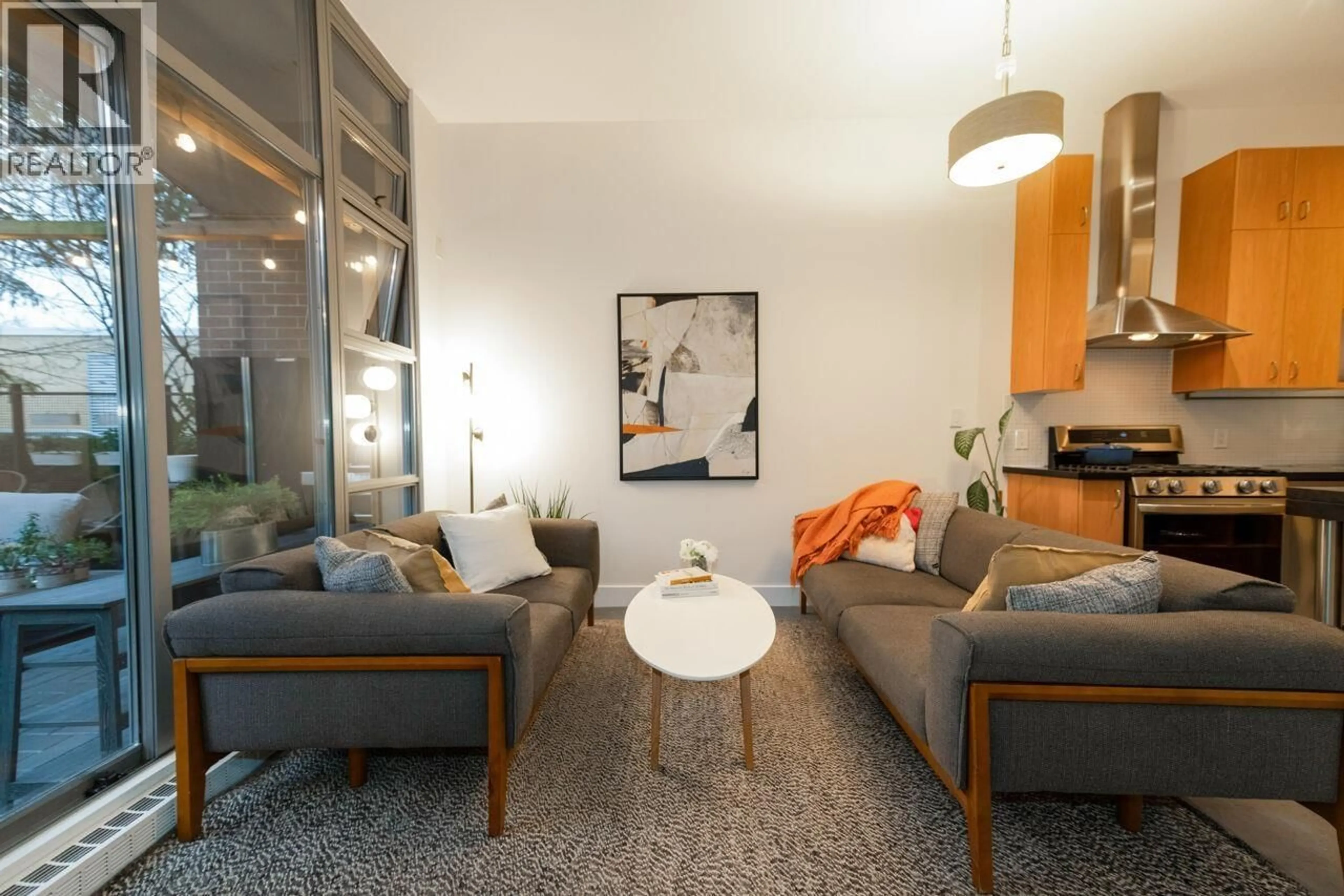 Living room with furniture, unknown for 101 - 2635 PRINCE EDWARD STREET, Vancouver British Columbia V5T4V7