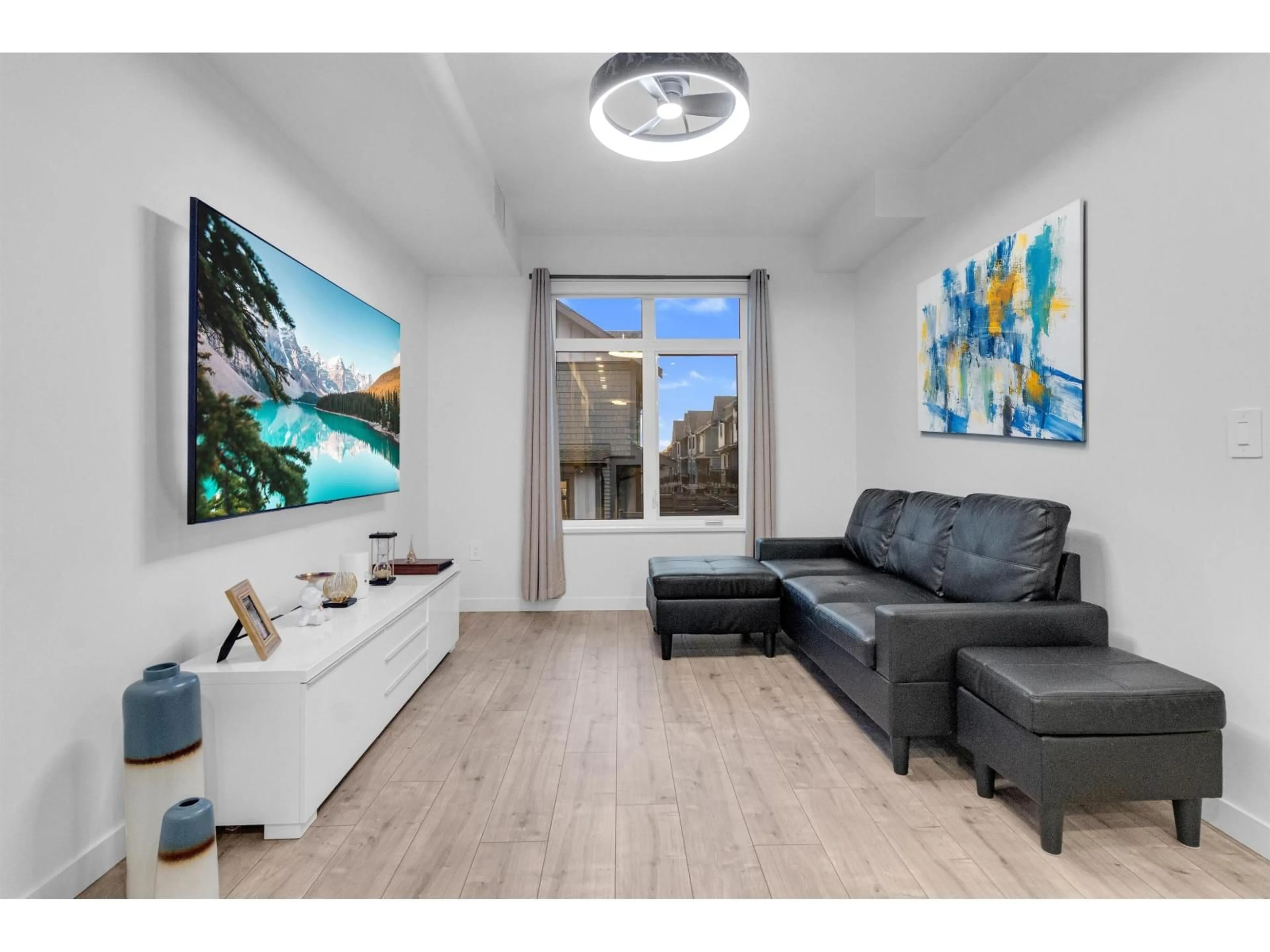 Living room with furniture, wood/laminate floor for 226 - 6951 204 STREET, Langley British Columbia V2Y1P8