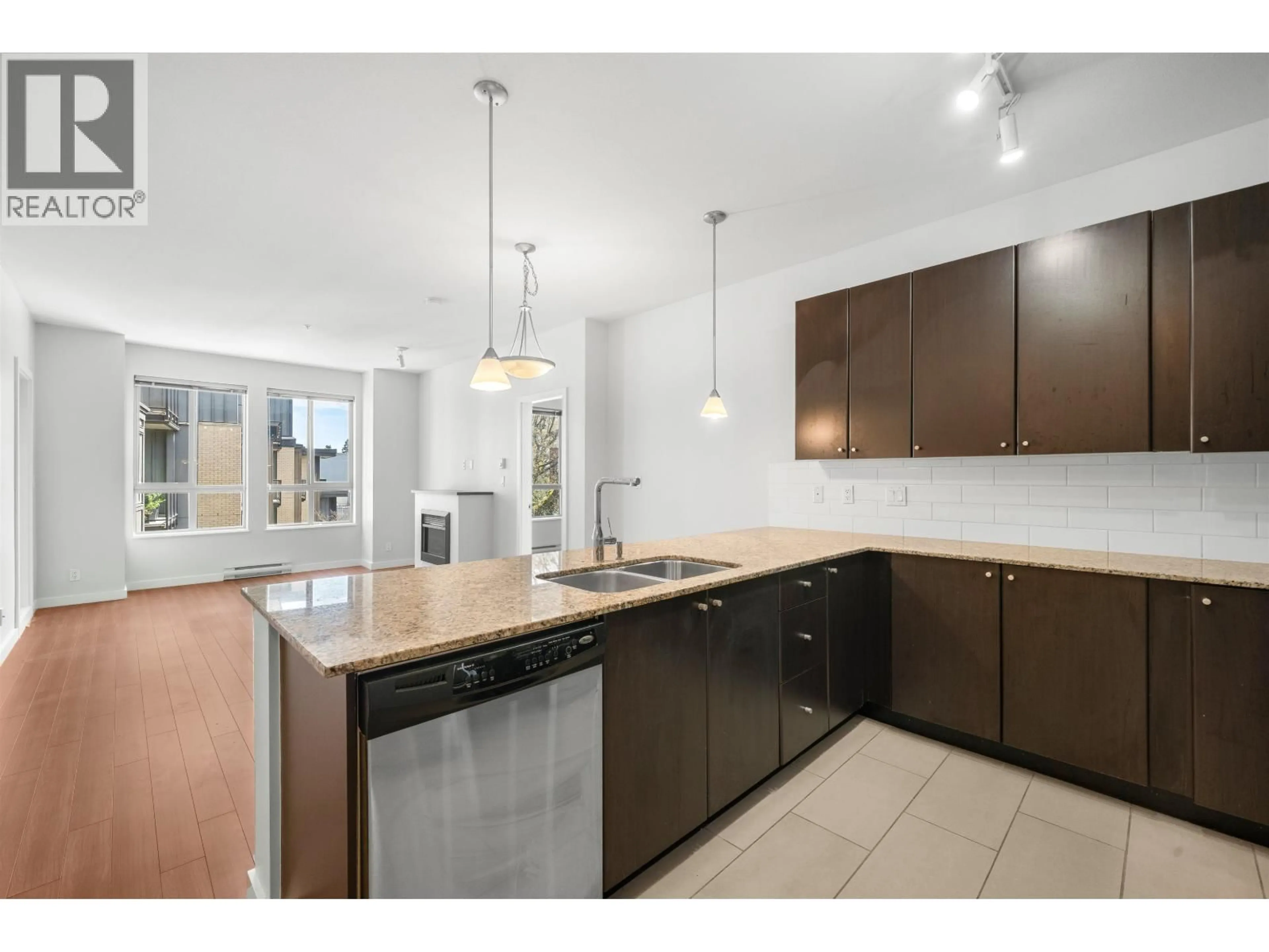 Open concept kitchen, ceramic/tile floor for 317 - 225 FRANCIS WAY, New Westminster British Columbia V3L0G1