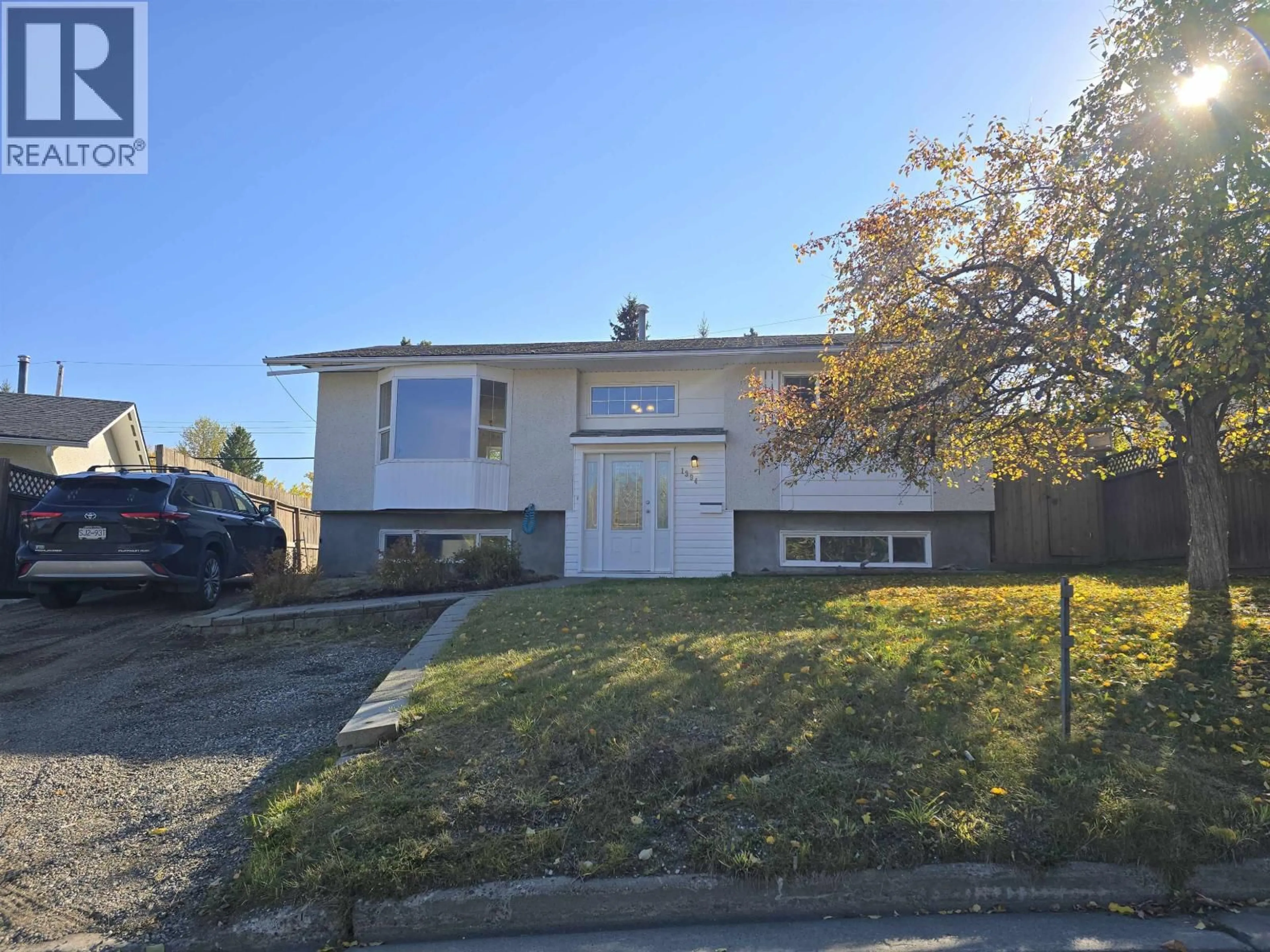 A pic from outside/outdoor area/front of a property/back of a property/a pic from drone, street for 1394 LEWIS DRIVE, Quesnel British Columbia V2J1K8