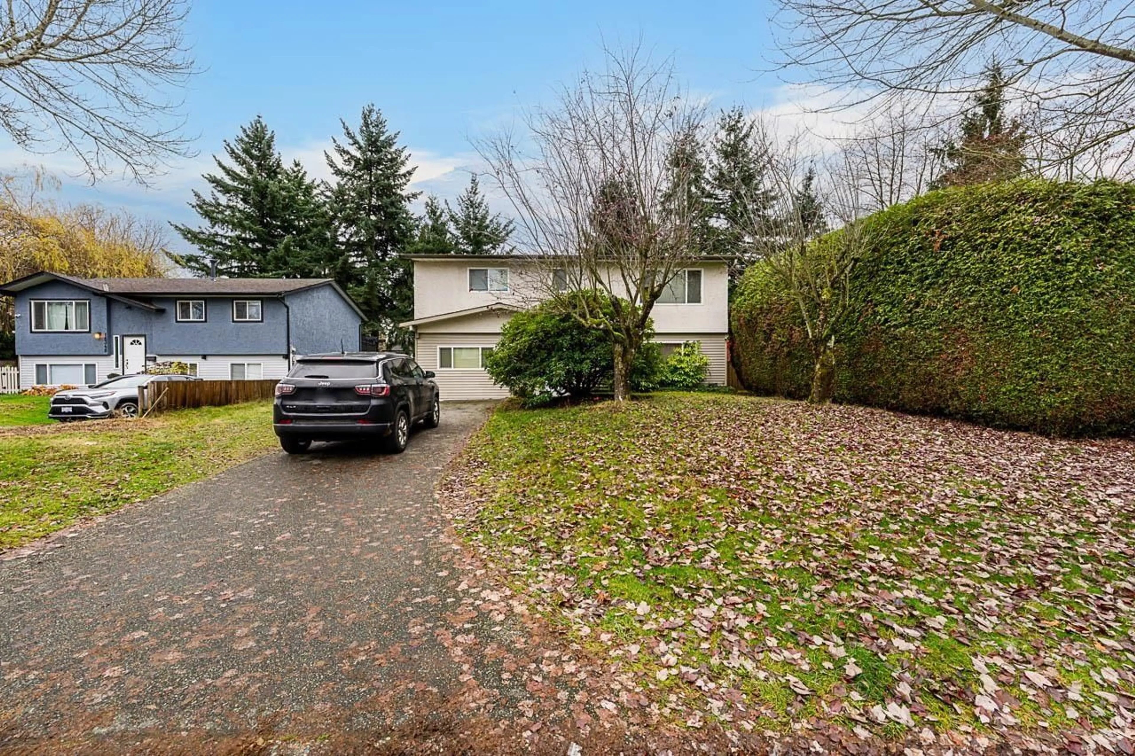A pic from outside/outdoor area/front of a property/back of a property/a pic from drone, street for 18340 63A AVENUE, Surrey British Columbia V3S8A8